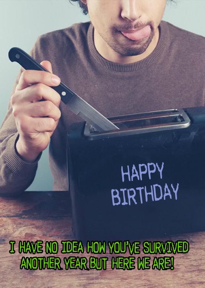 An accident prone person holding a Twisted Gifts Another Year Insulting Birthday Card.