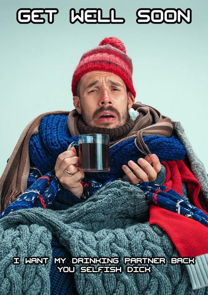 A man holding a cup of coffee with a Twisted Gifts Drinking Partner Insulting Get Well Soon Card.
