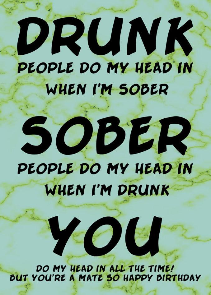 A Drunk And Sober Funny Birthday Card with a green and black text on a marbled surface by Twisted Gifts.