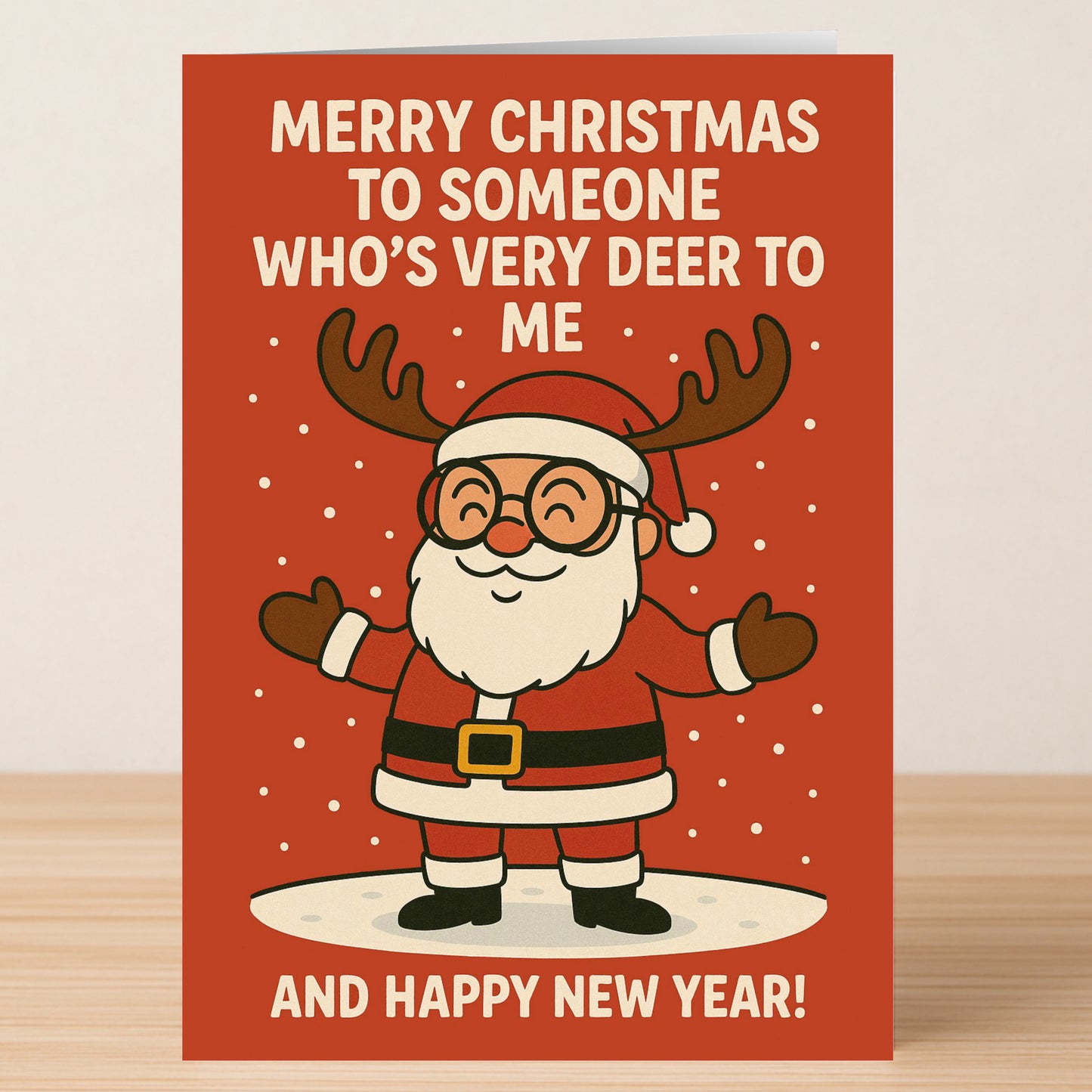 The Very Deer Christmas Card by Twisted Gifts features a cartoon Santa with reindeer antlers and arms open on a red background, with the message: "Merry Christmas to someone who's very deer to me and Happy New Year!.