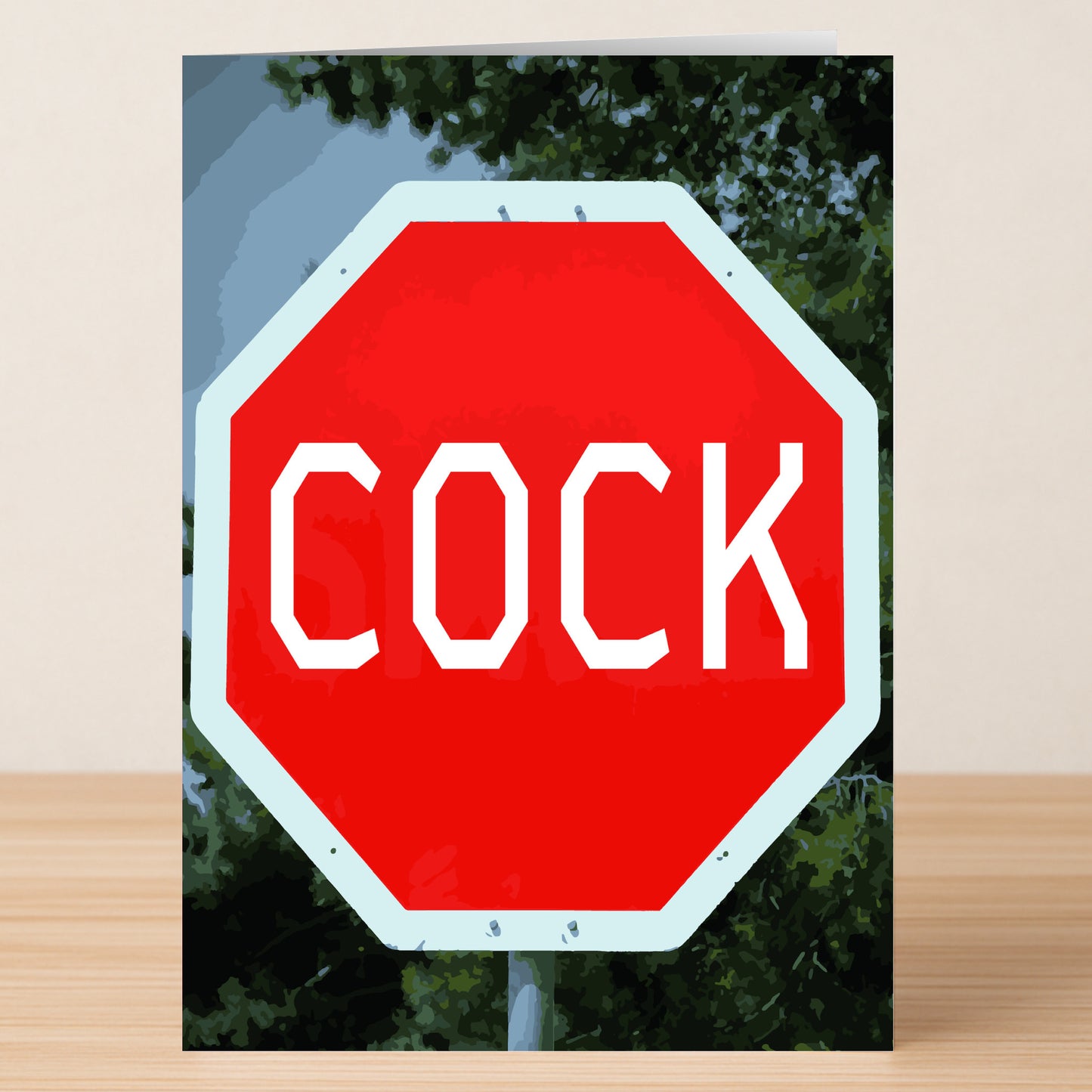 Twisted Gifts' Cock Rude Greeting Card features a red octagonal sign with "COCK" in white lettering amid green foliage—a funny card, perfect for anyone who appreciates bold, cheeky humor.