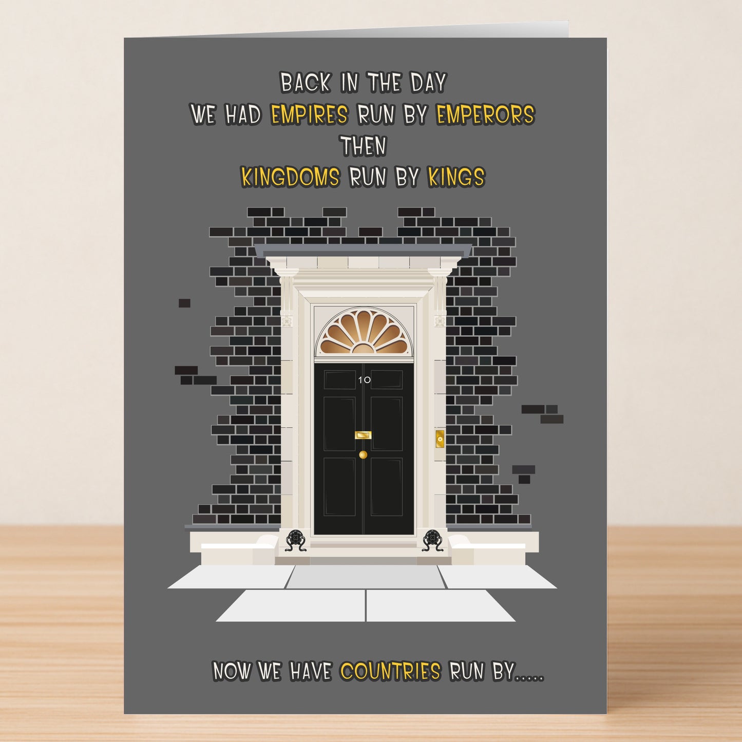 The Emperors – Funny Any Occasion Card by Twisted Gifts features a black door labeled "10" and the witty text: "Back in the day we had empires run by emperors, then kingdoms run by kings. Now we have countries run by...