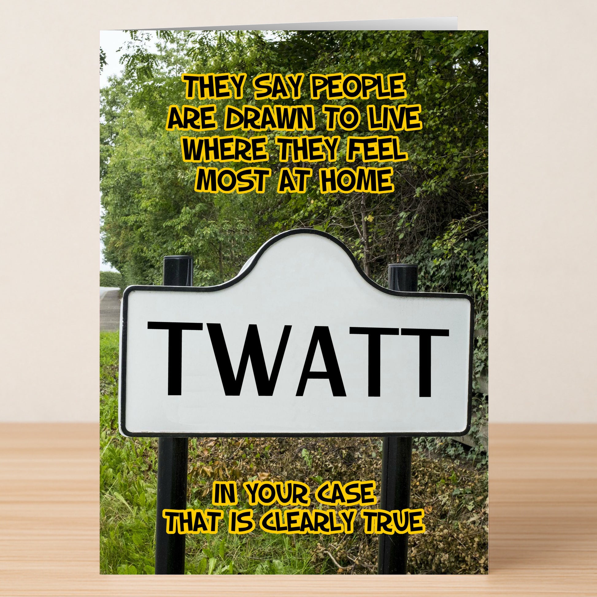 The Twatt Funny Greeting Card by Twisted Gifts features a road sign with "TWATT" and a witty yellow message about people living where they feel most at home.