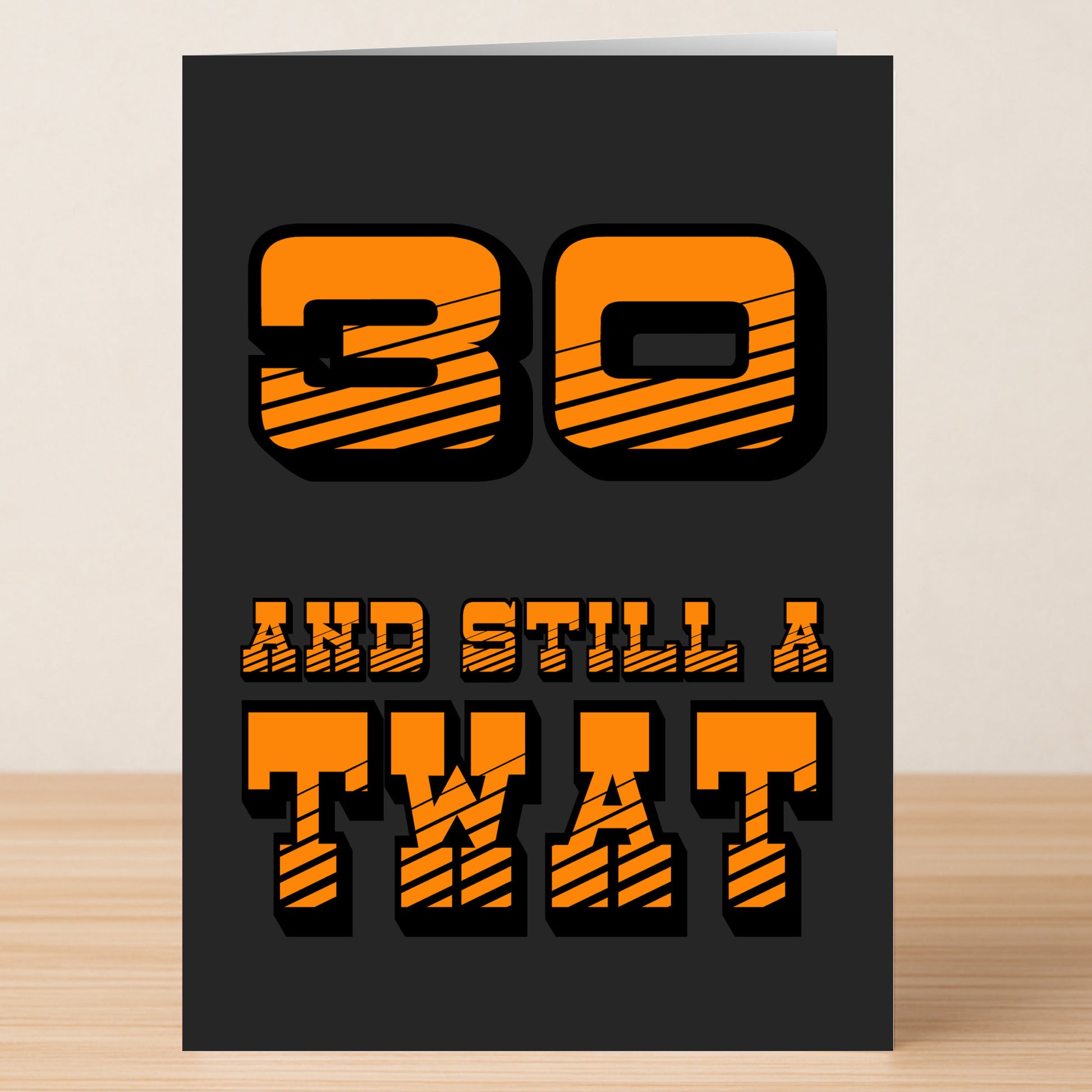The Twisted Gifts "30 - Still A Twat 30 Insulting Birthday Card" features bold orange text on a black background reading "30 AND STILL A TWAT," perfect for a funny 30th birthday.