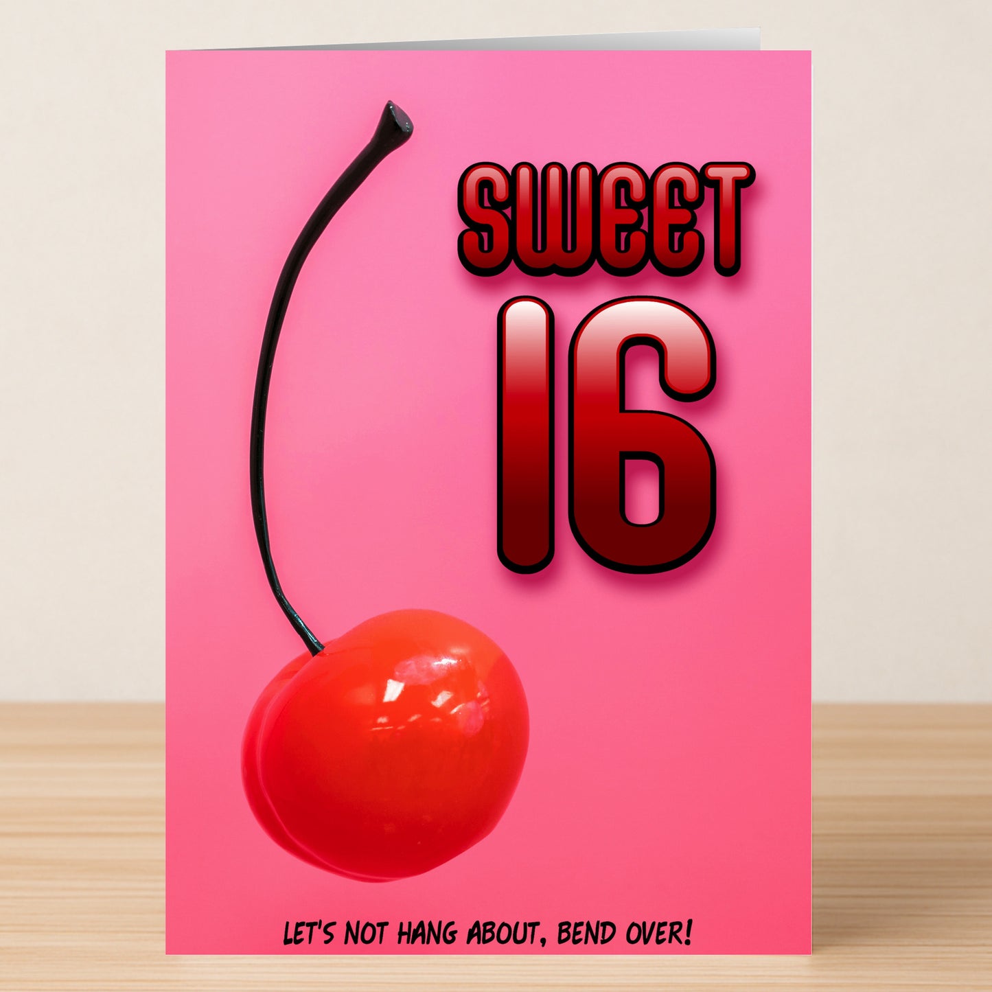 The Twisted Gifts 16 - Sweet 16 Rude Birthday Card features a bold "SWEET 16," a large cherry, and the cheeky message "LET'S NOT HANG ABOUT, BEND OVER!" on a pink background—ideal for fun birthday wishes.