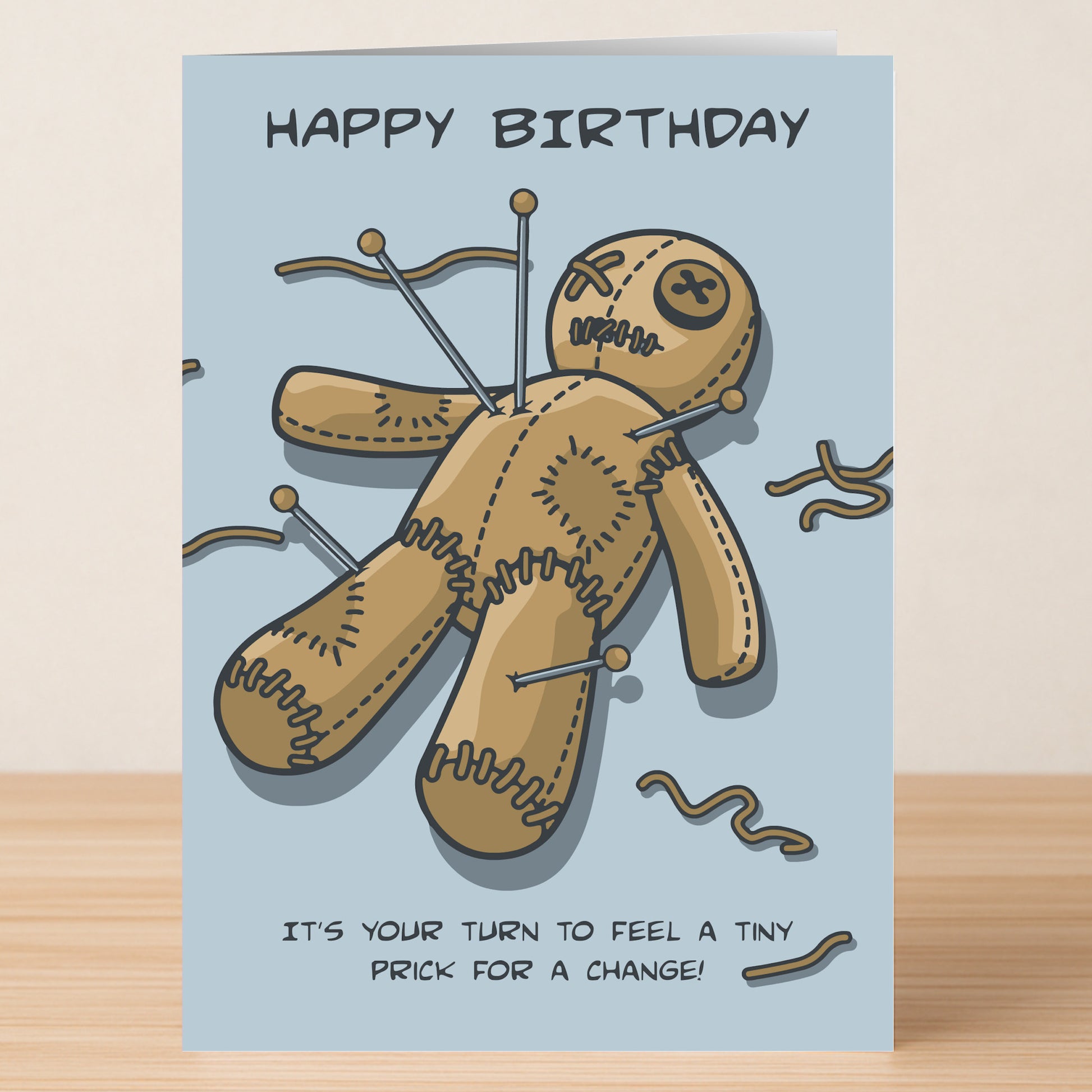 The Tiny Prick Rude Birthday Card by Twisted Gifts features a stitched voodoo doll with pins, “Happy Birthday” text, and the cheeky message “It’s your turn to feel a tiny prick for a change!”—ideal for anyone with a sense of humor.