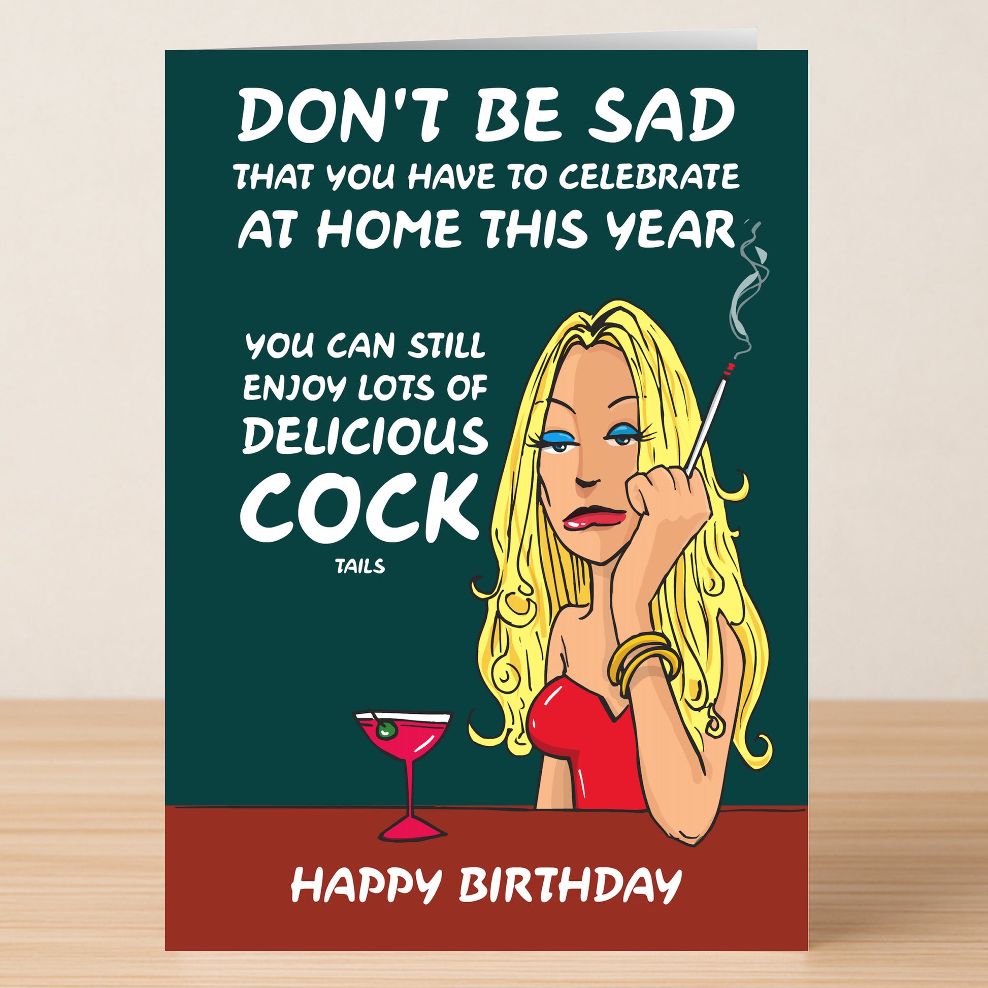 A cartoon woman in a red dress holds a cigarette next to Twisted Gifts’ Cock Tails Rude Birthday Card, featuring cheeky humor and a playful "Cock Tails" double entendre for celebrating birthdays at home.