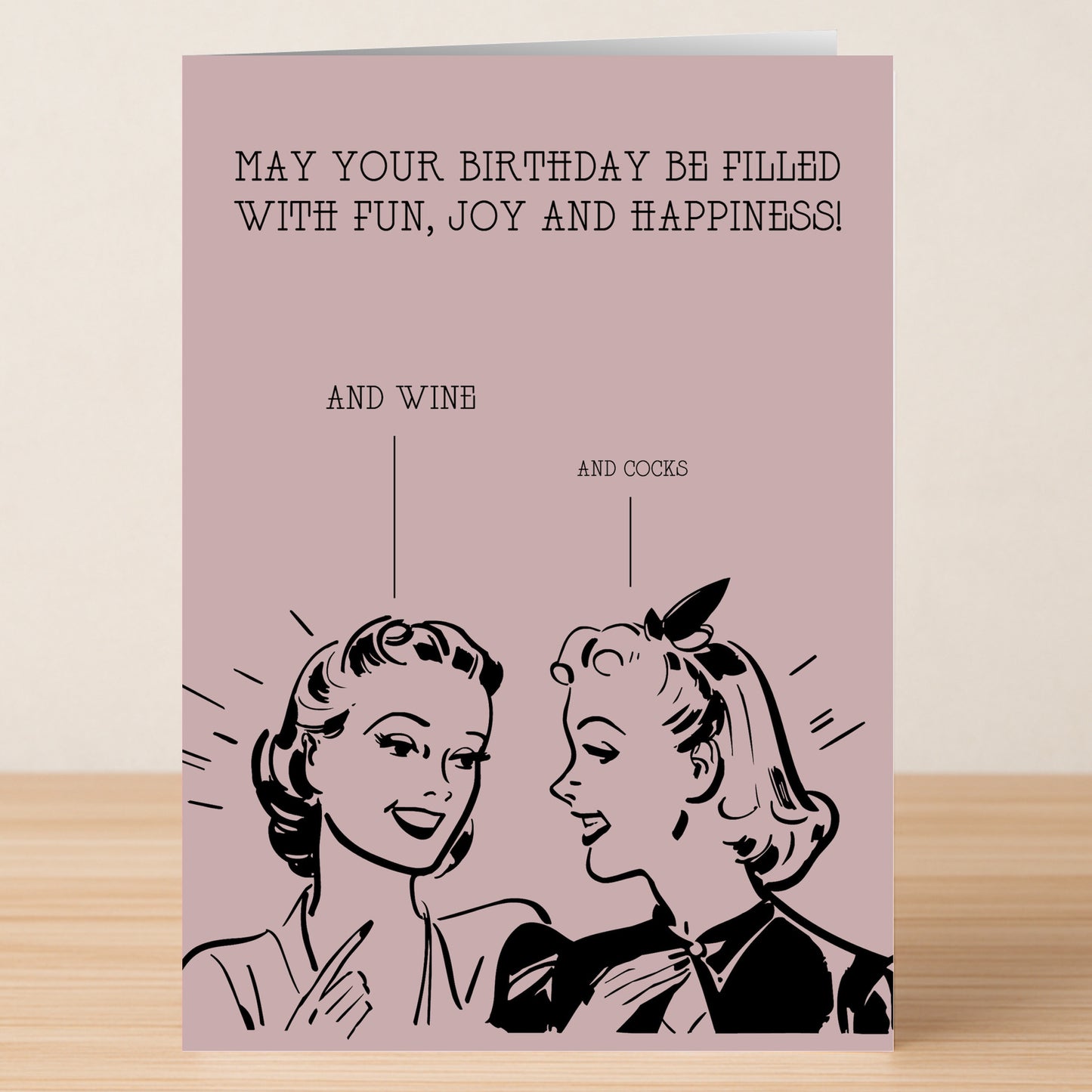 The Fun And Joy Rude Birthday Card by Twisted Gifts features a retro illustration of two women talking, with the text "May your birthday be filled with fun, joy and happiness!" plus cheeky labels "and wine" and "and cocks.