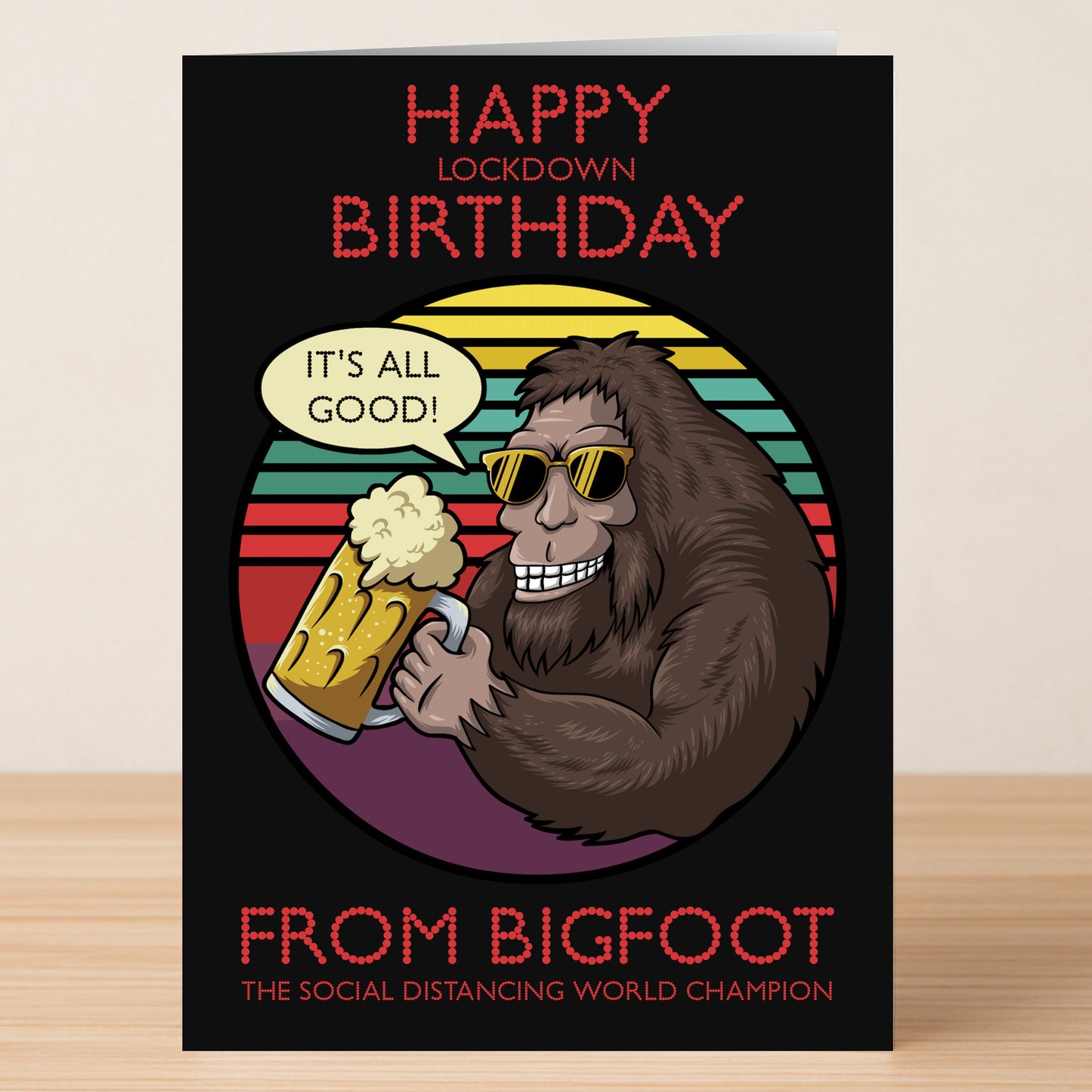 The BigFoot Funny Birthday Card by Twisted Gifts features a cartoon Bigfoot in sunglasses holding a beer with the message: “Happy Lockdown Birthday from Bigfoot, the social distancing world champion!” Perfect for animal lovers with humor.