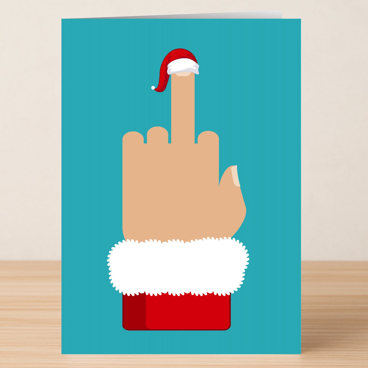 The Twisted Gifts Santa Finger Rude Christmas Card shows a hand in a festive sleeve flipping the bird with a Santa hat-topped finger on a teal background—a cheeky way to add humor to your holiday greetings.