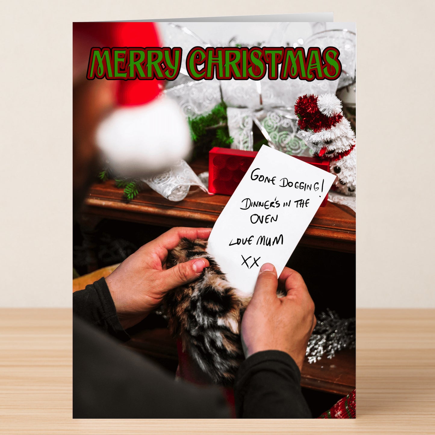 Inject humor into your holidays with Twisted Gifts' "Gone Dogging Rude Christmas Card." Featuring a cheeky note and festive decor, this unique card is perfect for laughs and makes any Christmas unforgettable.