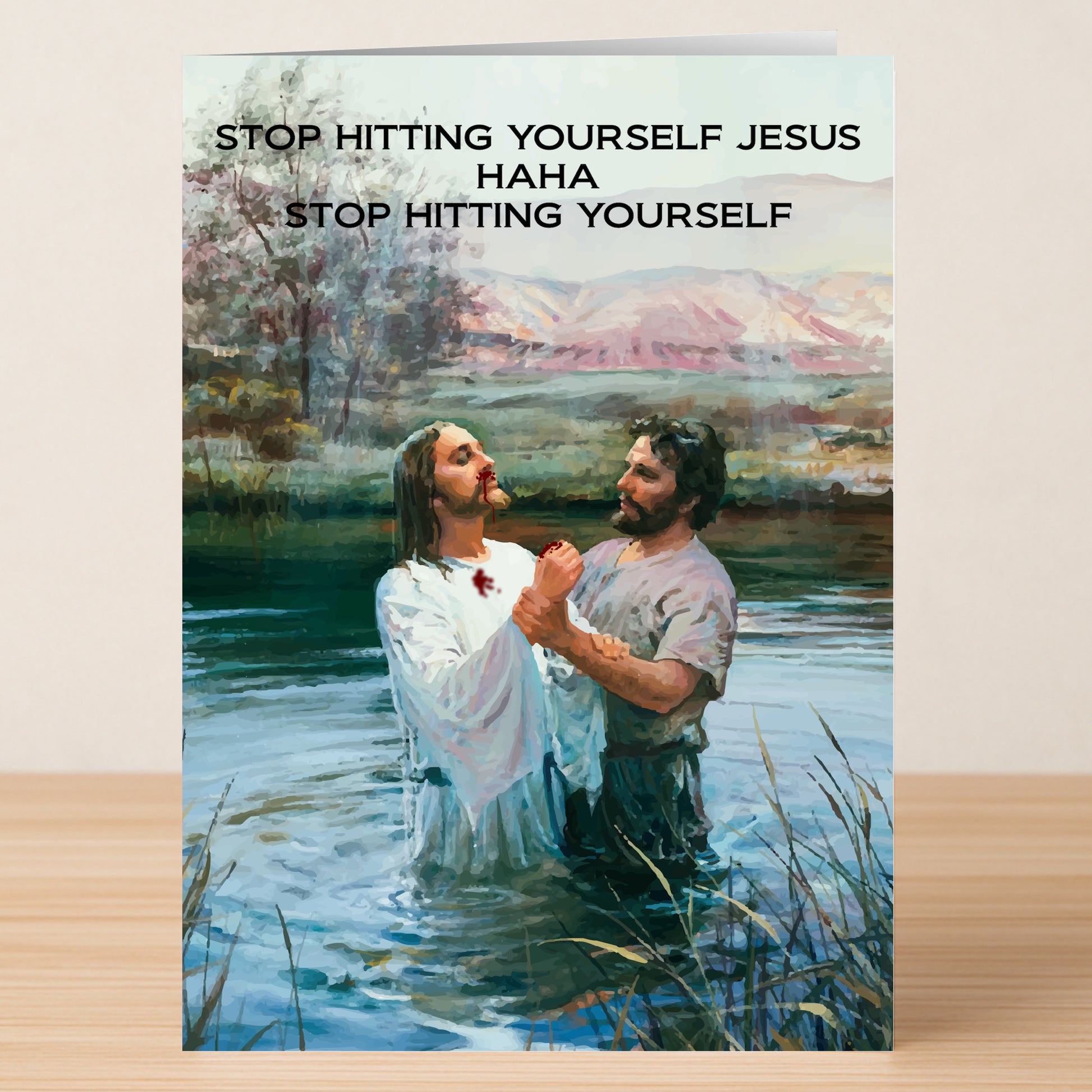 The Stop Hitting Yourself Funny Christmas Card by Twisted Gifts features a painted scene of Jesus being baptized by John the Baptist with the humorous text "STOP HITTING YOURSELF JESUS HAHA STOP HITTING YOURSELF." A unique holiday card to stand out!.