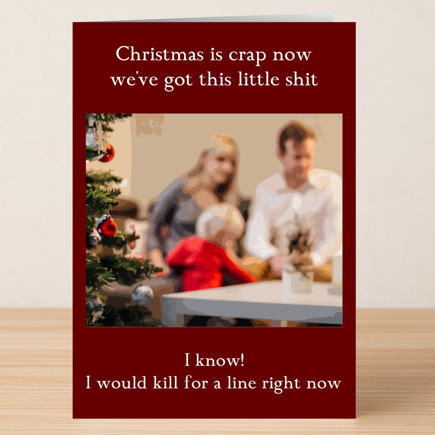 Share some unconventional holiday cheer with the Little Shit Funny Christmas Card by Twisted Gifts, featuring a blurred family by a tree and cheeky text for those who appreciate humor at Christmas.