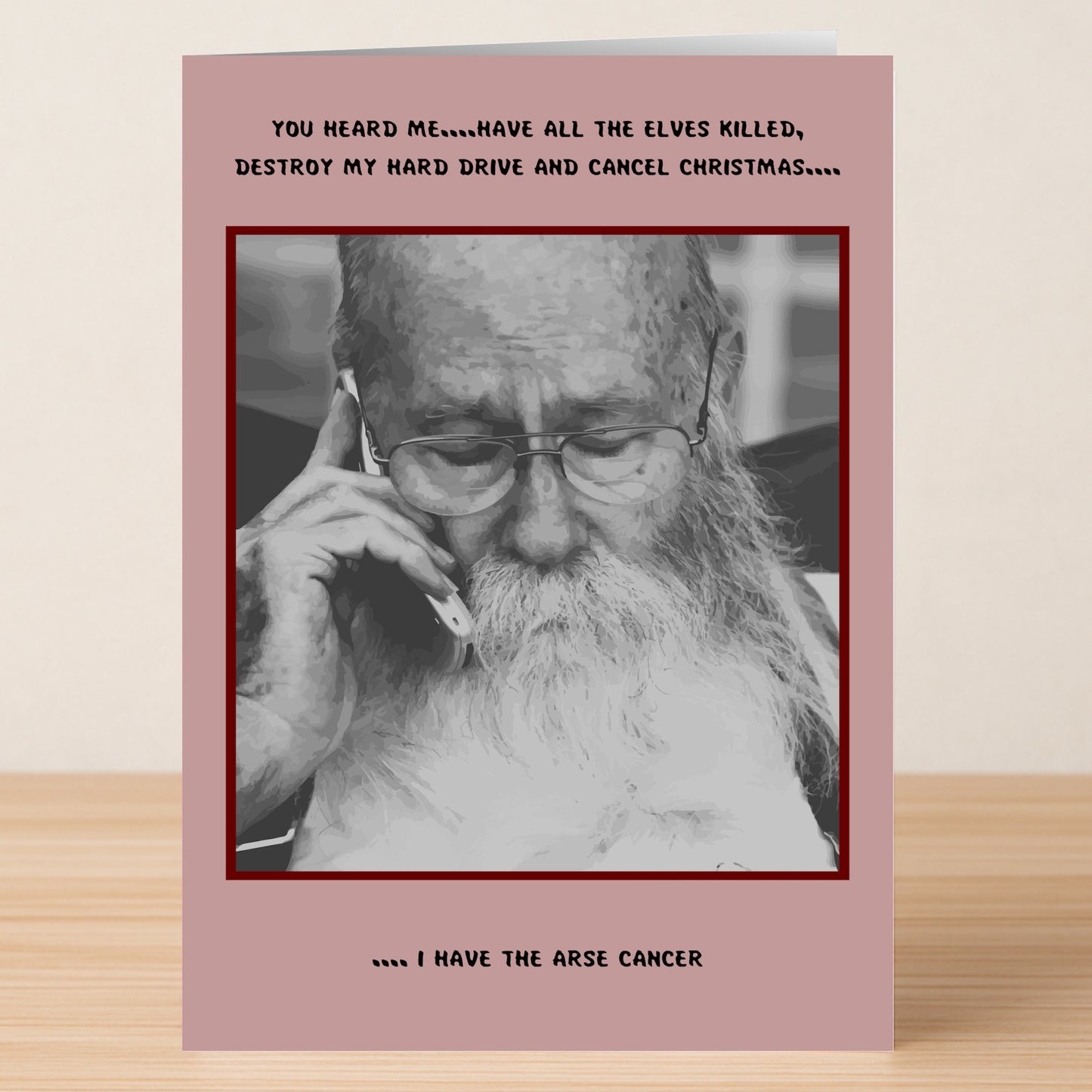 The Cancel Christmas Funny Christmas Card by Twisted Gifts features an older man with glasses and a white beard on the phone, sharing irreverent holiday humor about Christmas and illness for a lighthearted, festive twist.