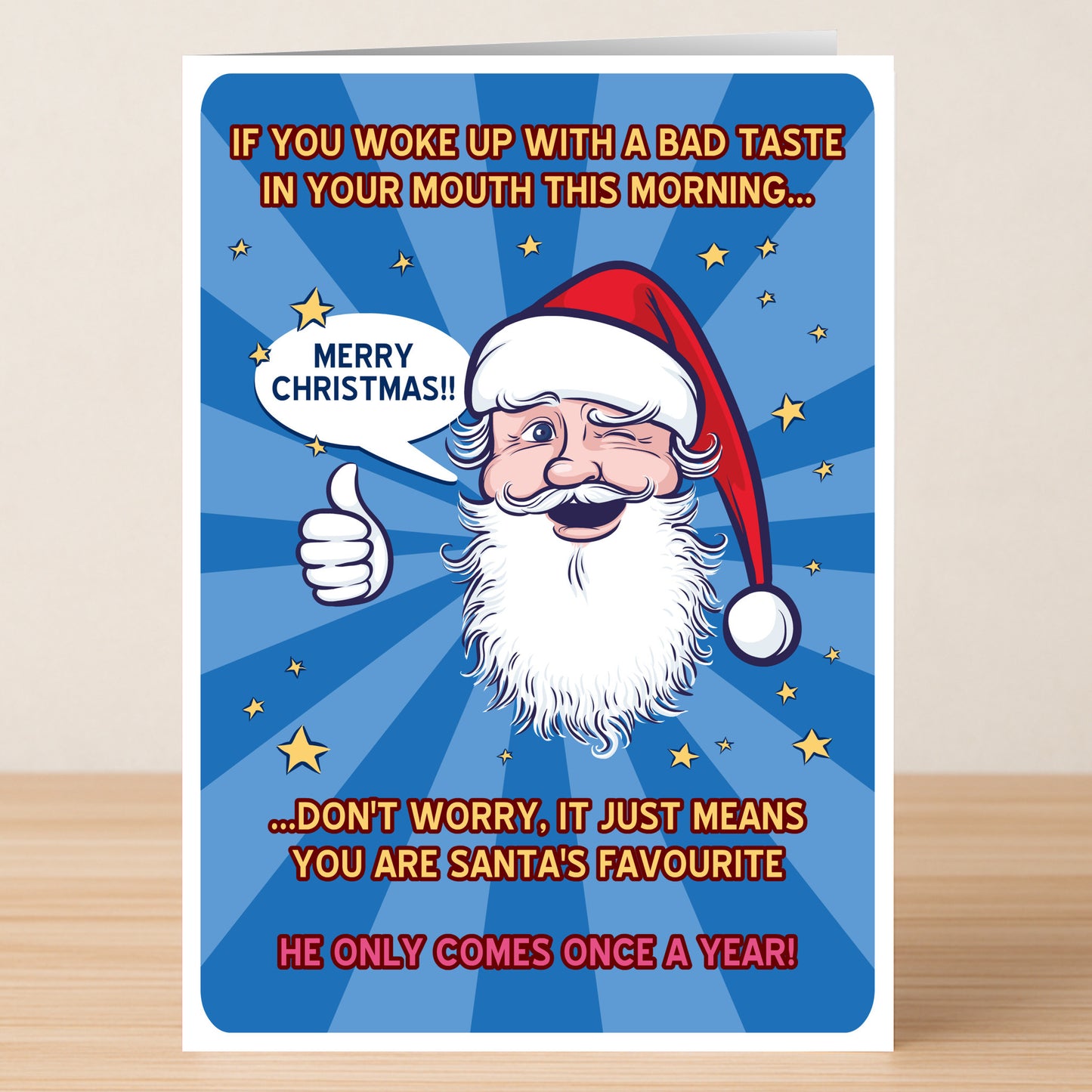 The Bad Taste Rude Christmas Card by Twisted Gifts features a cartoon Santa winking and giving a thumbs up with funny "Santa’s favorite" text and a "Merry Christmas!!" speech bubble—perfect for spreading cheeky holiday cheer.
