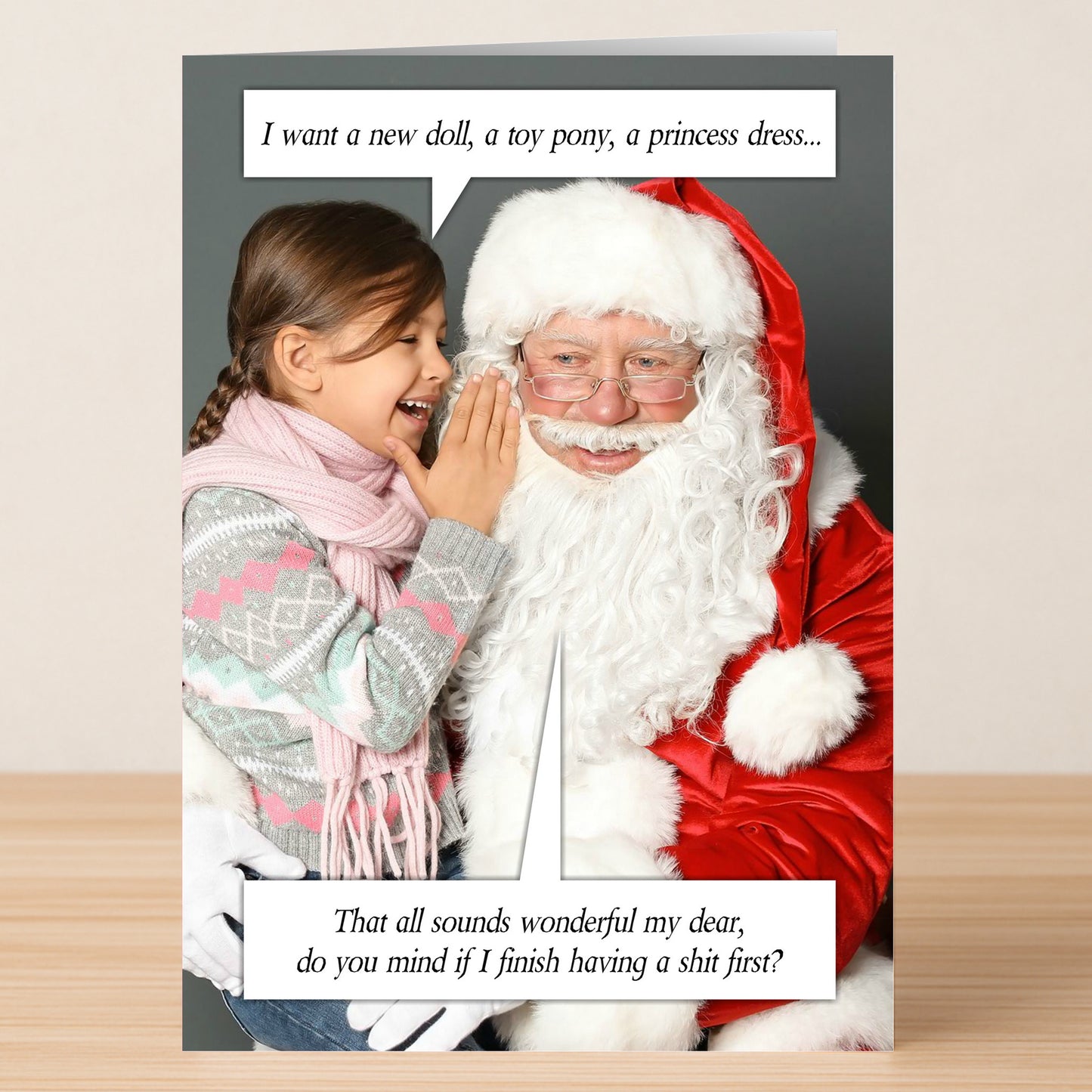 A girl in winter clothes whispers to Santa, asking for gifts as he humorously says, "Let me finish first!" This hilarious scene makes the Twisted Gifts Finish First Funny Christmas Card perfect for holiday laughs.