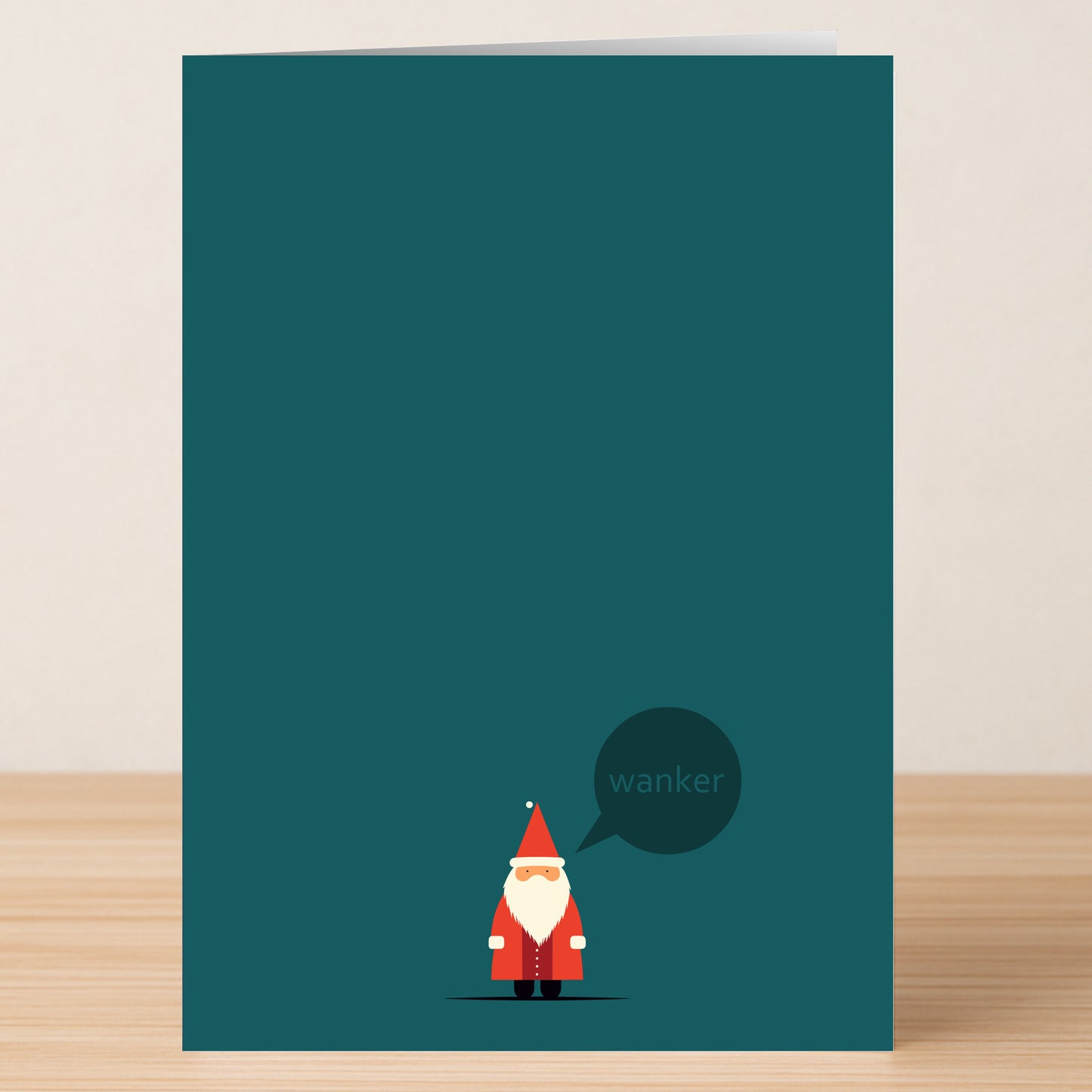 The Wanker Funny Christmas Card by Twisted Gifts features a minimalist Santa with a "wanker" speech bubble on a teal background—a hilarious holiday card for the festive season.