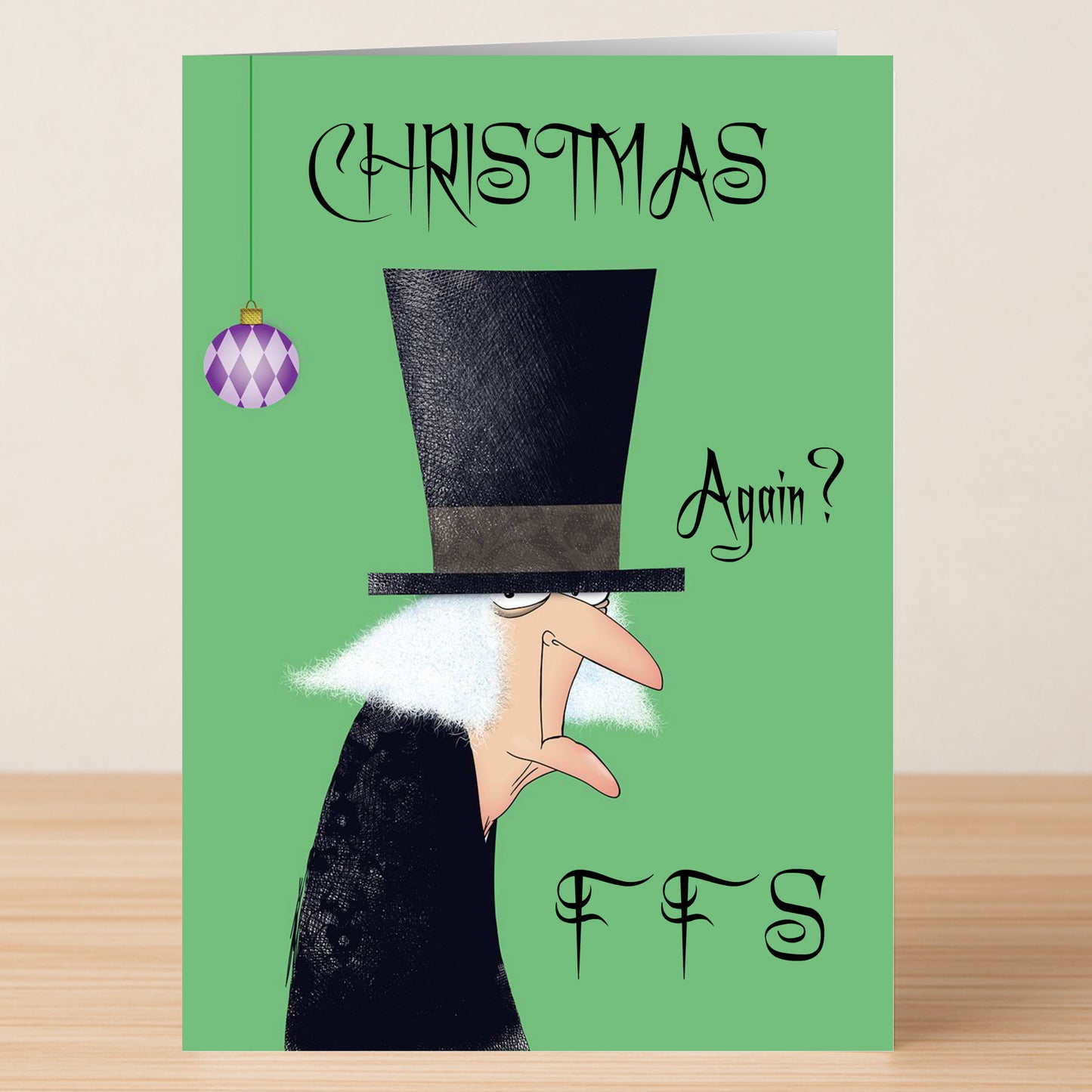 The "Christmas Again Funny Christmas Card" by Twisted Gifts features a cartoon grumpy man in a tall black hat, a purple ornament, and the text "CHRISTMAS Again? FFS." Share some sarcastic holiday cheer!.