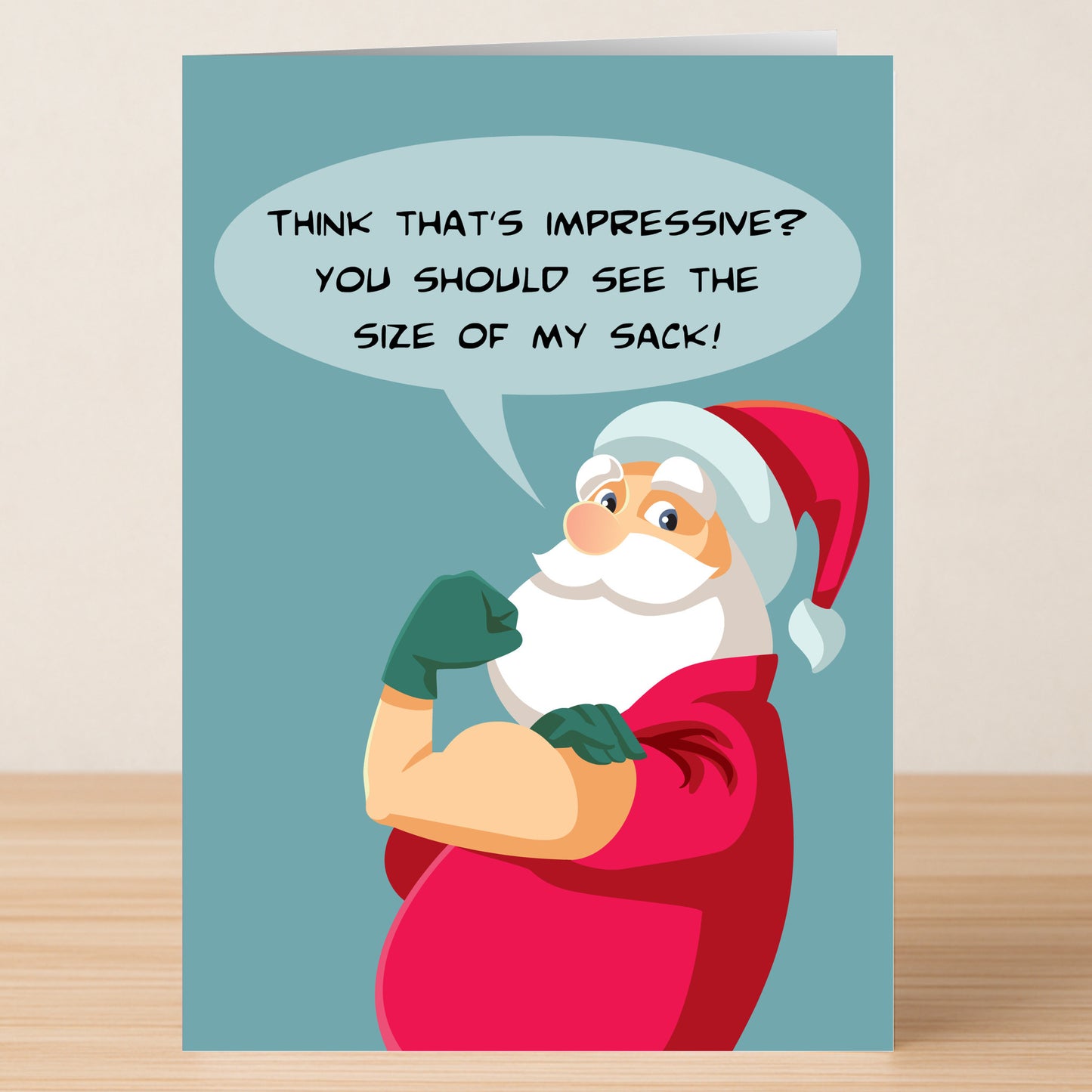 The My Sack Rude Christmas Card by Twisted Gifts features Santa flexing his arm and joking, "Think that's impressive? You should see the size of my sack!"—a cheeky card to spread holiday cheer.