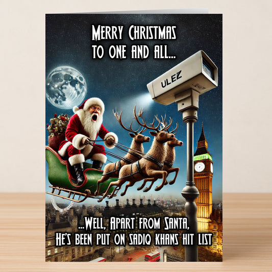 The Twisted Gifts ULEZ Funny Christmas Card shows Santa flying over London with Big Ben and a giant ULEZ camera, cleverly poking fun at Sadiq Khan’s festive hit list.