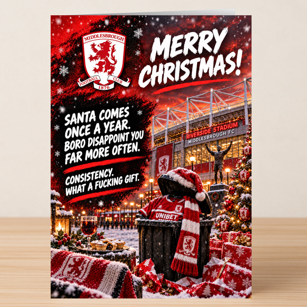A Middlesbrough – Funny Christmas card featuring the club logo, a stadium, and a scarf-wearing trash can with the text: “Santa comes once a year. Boro disappoint you far more often.”