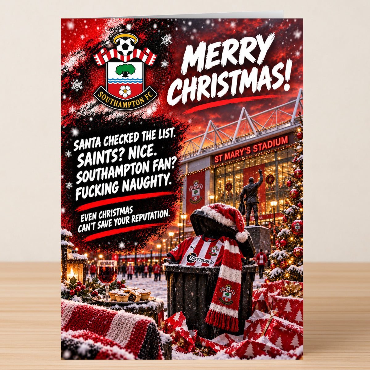 A funny Southampton FC – Funny Christmas Card featuring the team crest and stadium, with text calling fans “fucking naughty.”