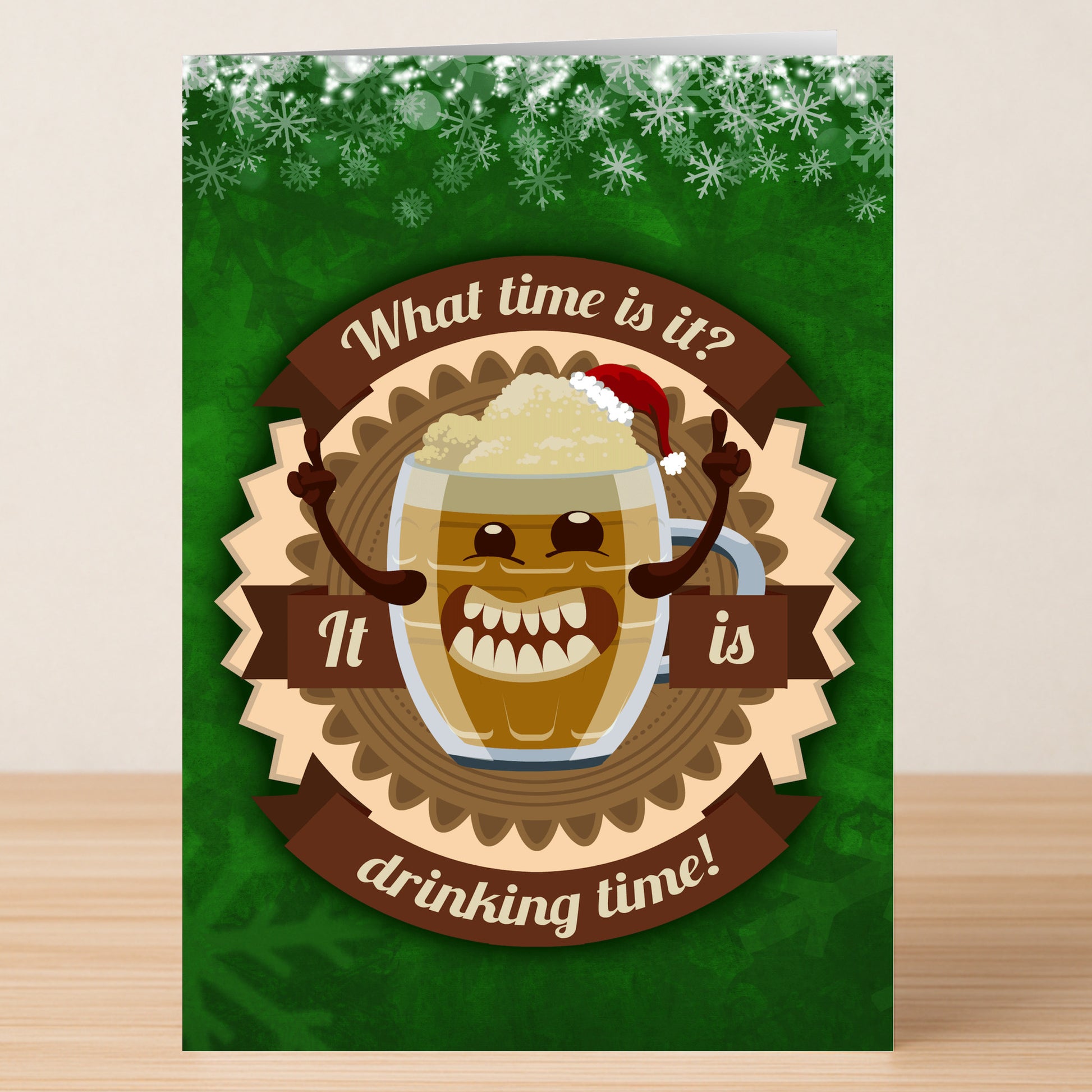 The Drinking Time Funny Christmas Card by Twisted Gifts features a smiling cartoon beer mug in a Santa hat with the message, "What time is it? It is drinking time!" on a green, snowflake background—perfect for holiday cheer.