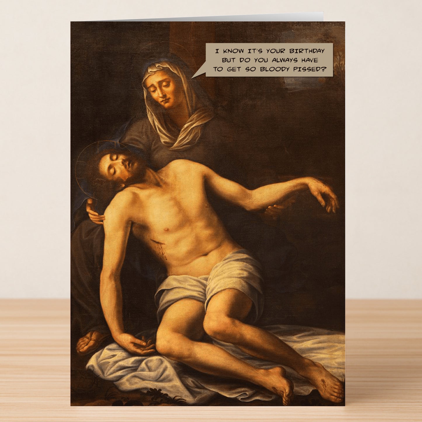 The Birthday Boy Funny Christmas Card by Twisted Gifts features Mary holding Jesus with a witty speech bubble—perfect for a holiday birthday laugh!.