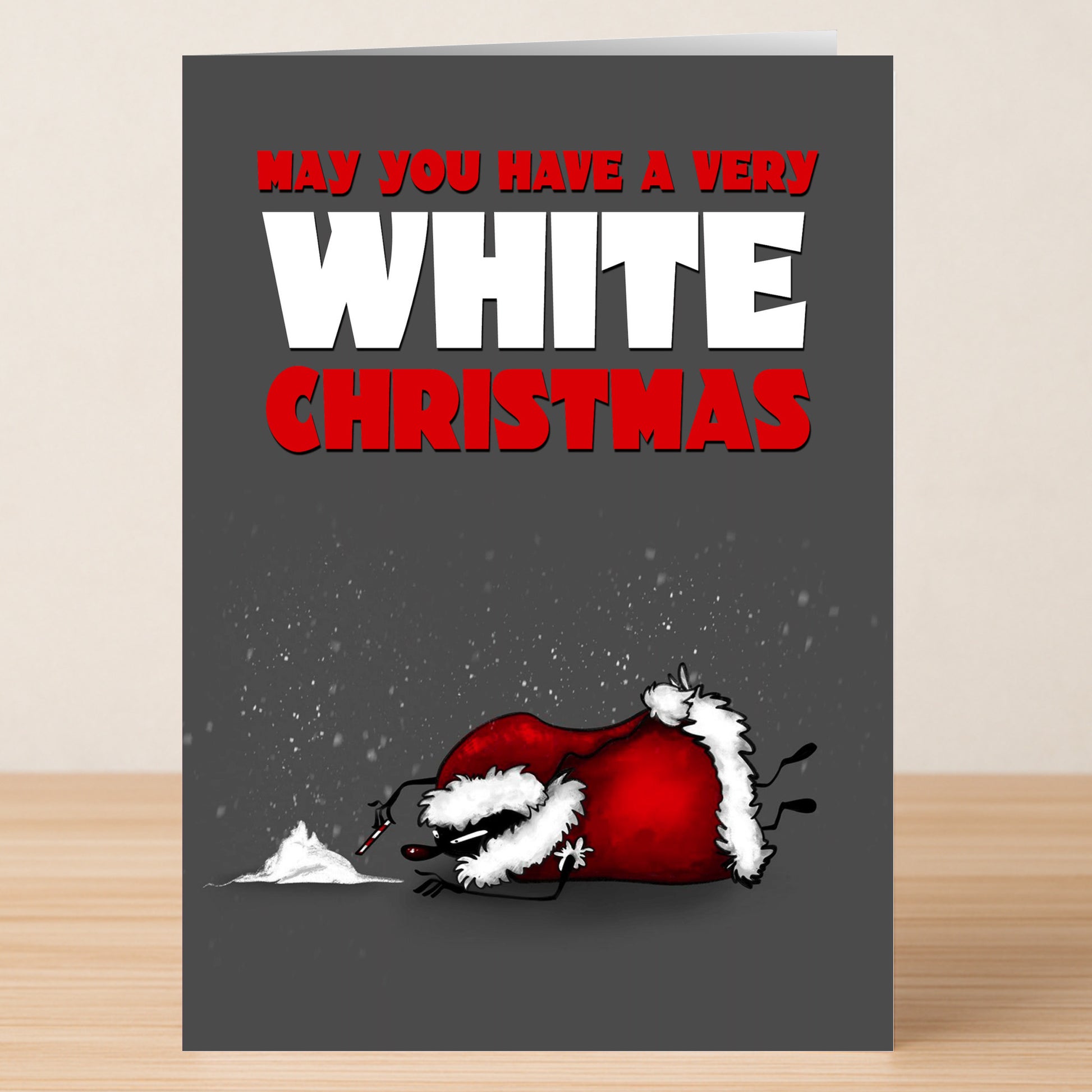 The White Christmas Funny Christmas Card by Twisted Gifts features a cartoon Santa face-down near white powder with "May you have a very WHITE CHRISTMAS" in bold letters—a unique and humorous holiday greeting.