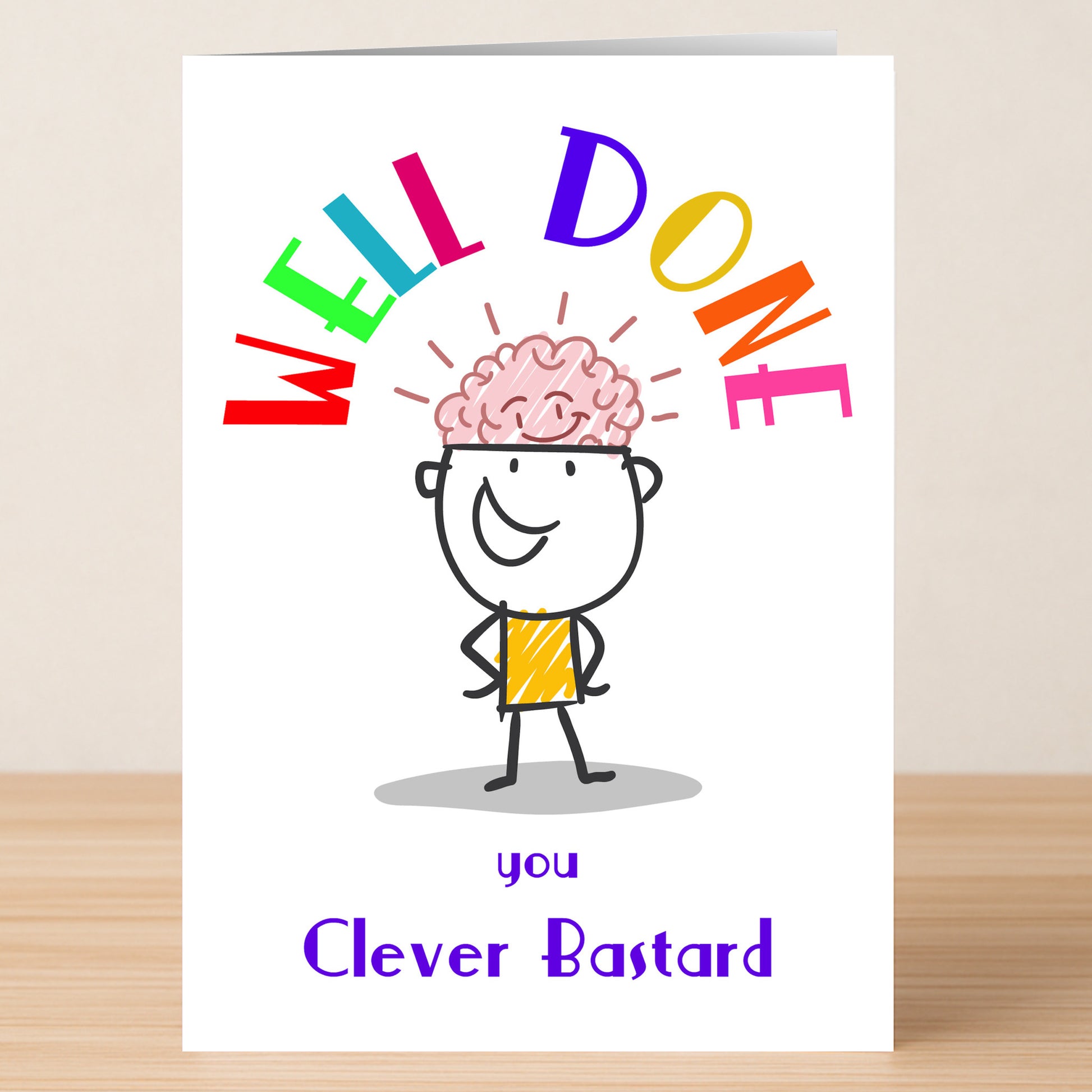 The Clever Funny Congratulations Card by Twisted Gifts features a cartoon brain character with colorful "WELL DONE" text and "you Clever Bastard" below—an amusing greeting card ideal for celebrating someone's achievement.