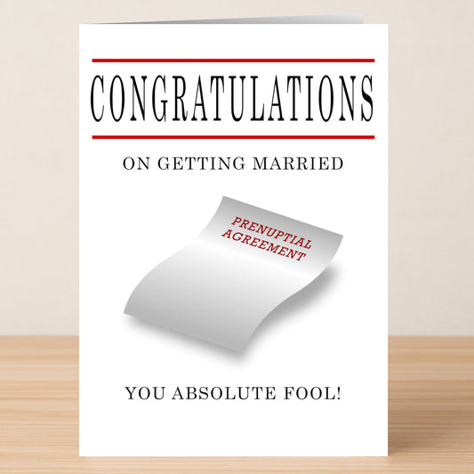 The Prenup Rude Congratulations Card from Twisted Gifts features “CONGRATULATIONS ON GETTING MARRIED YOU ABSOLUTE FOOL!” plus a prenuptial agreement on the front for a truly sarcastic twist.