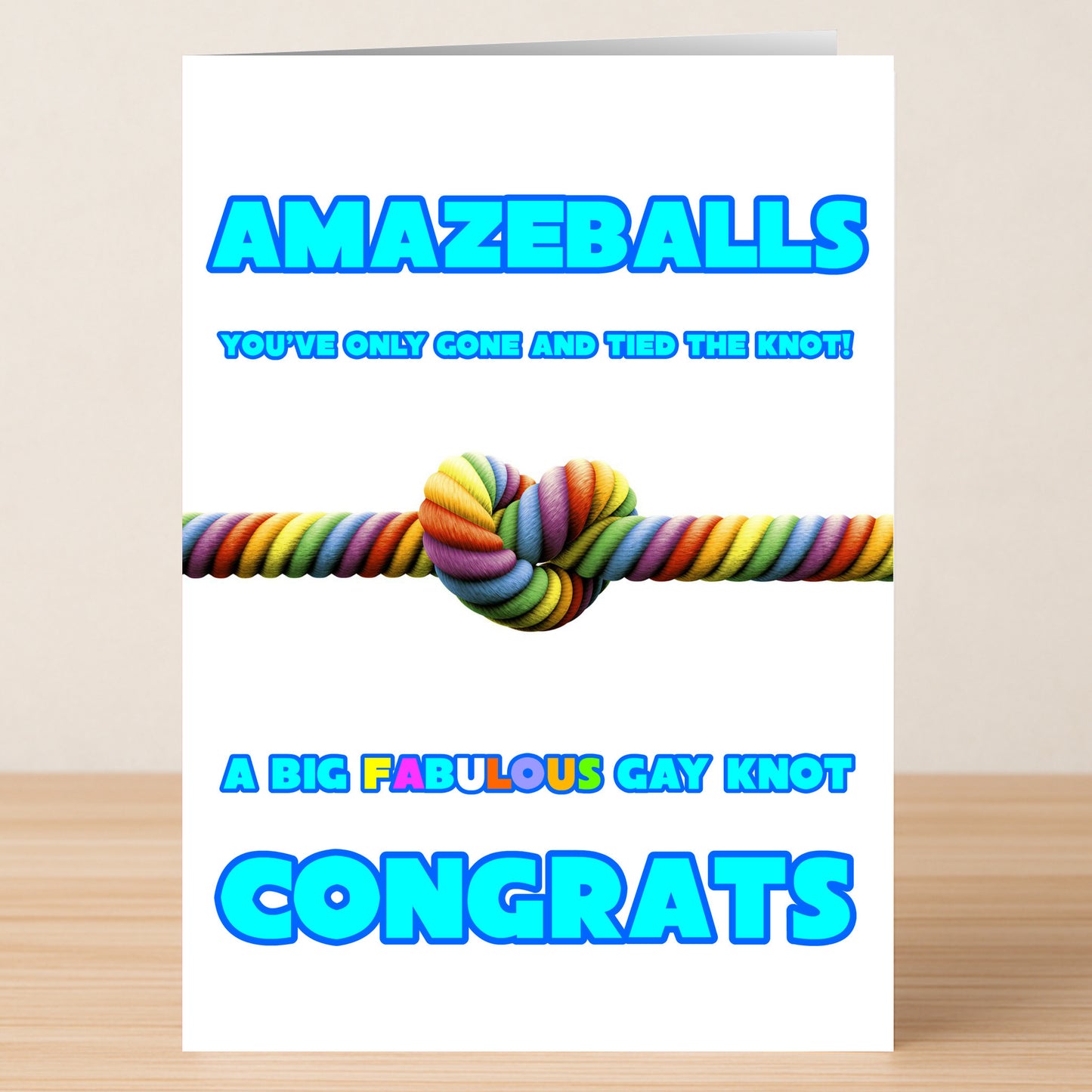Congratulations! The Amazeballs Funny Congratulations Card by Twisted Gifts features a rainbow knot and bold "Amazeballs" text—an uplifting, unique way to celebrate love and tying the knot!.