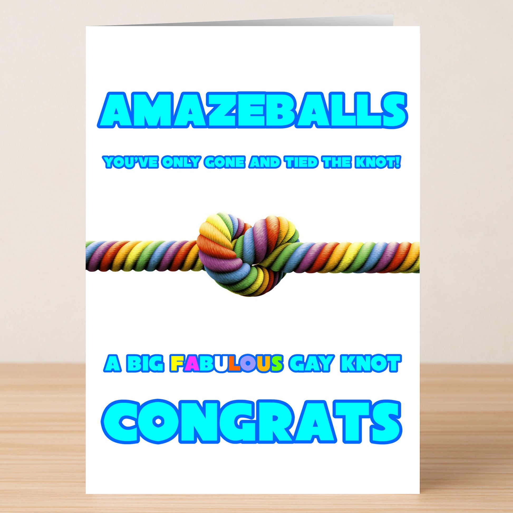 Congratulations! The Amazeballs Funny Congratulations Card by Twisted Gifts features a rainbow knot and bold "Amazeballs" text—an uplifting, unique way to celebrate love and tying the knot!.