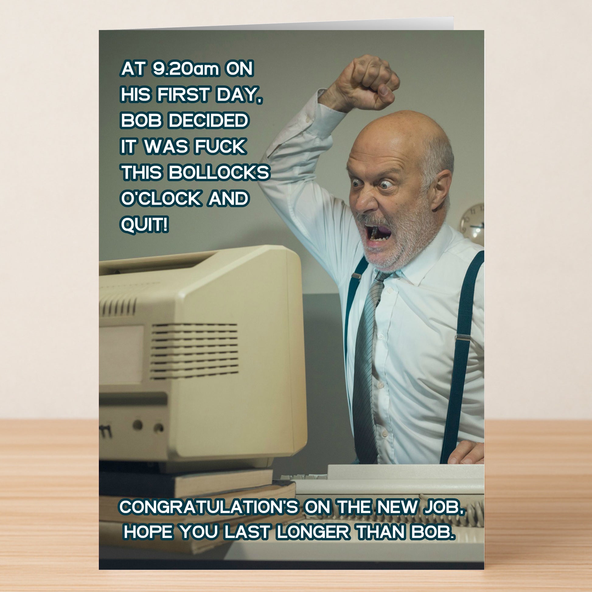 The Bob Funny Congratulations Card by Twisted Gifts shows a bald man in office wear angrily shaking his fist at an old computer, with clever quitting wordplay—ideal for congratulating someone celebrating early “retirement”!.