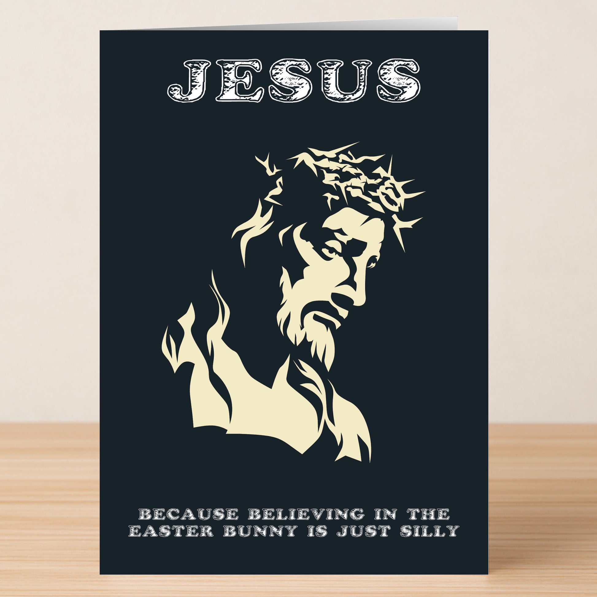 The Silly Funny Easter Card by Twisted Gifts features a stylized Jesus with a crown of thorns and the phrase, "JESUS. Because believing in the Easter Bunny is just silly." Add some punny humor to your holiday celebration!.