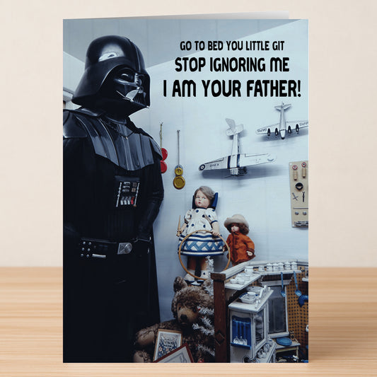 The I Am Your Father Funny Father's Day Card by Twisted Gifts features Darth Vader in a child's room with toys, quoting "Go to bed you little git. Stop ignoring me. I am your father!"—a hilarious Star Wars-themed card for Father's Day.