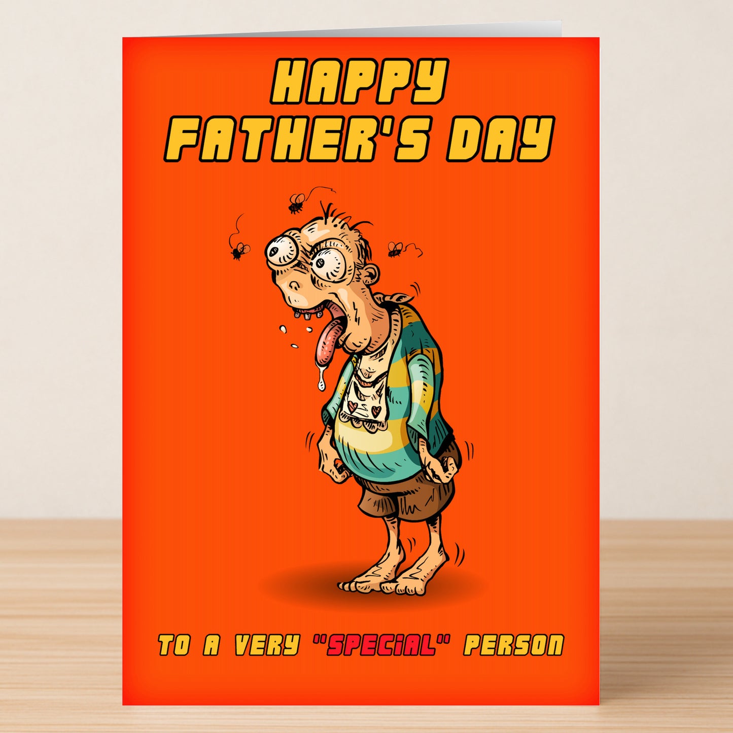 Twisted Gifts' Special Insulting Father's Day Card features a cartoon disheveled man with "Happy Father's Day to a very 'special' person" on an orange background.