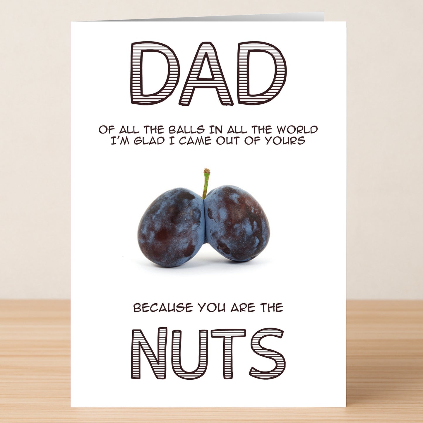 The Best Nuts Funny Father's Day Card by Twisted Gifts reads, "Dad, of all the balls in all the world I'm glad I came out of yours because you are the nuts," with two plums for a hilarious card he'll love.