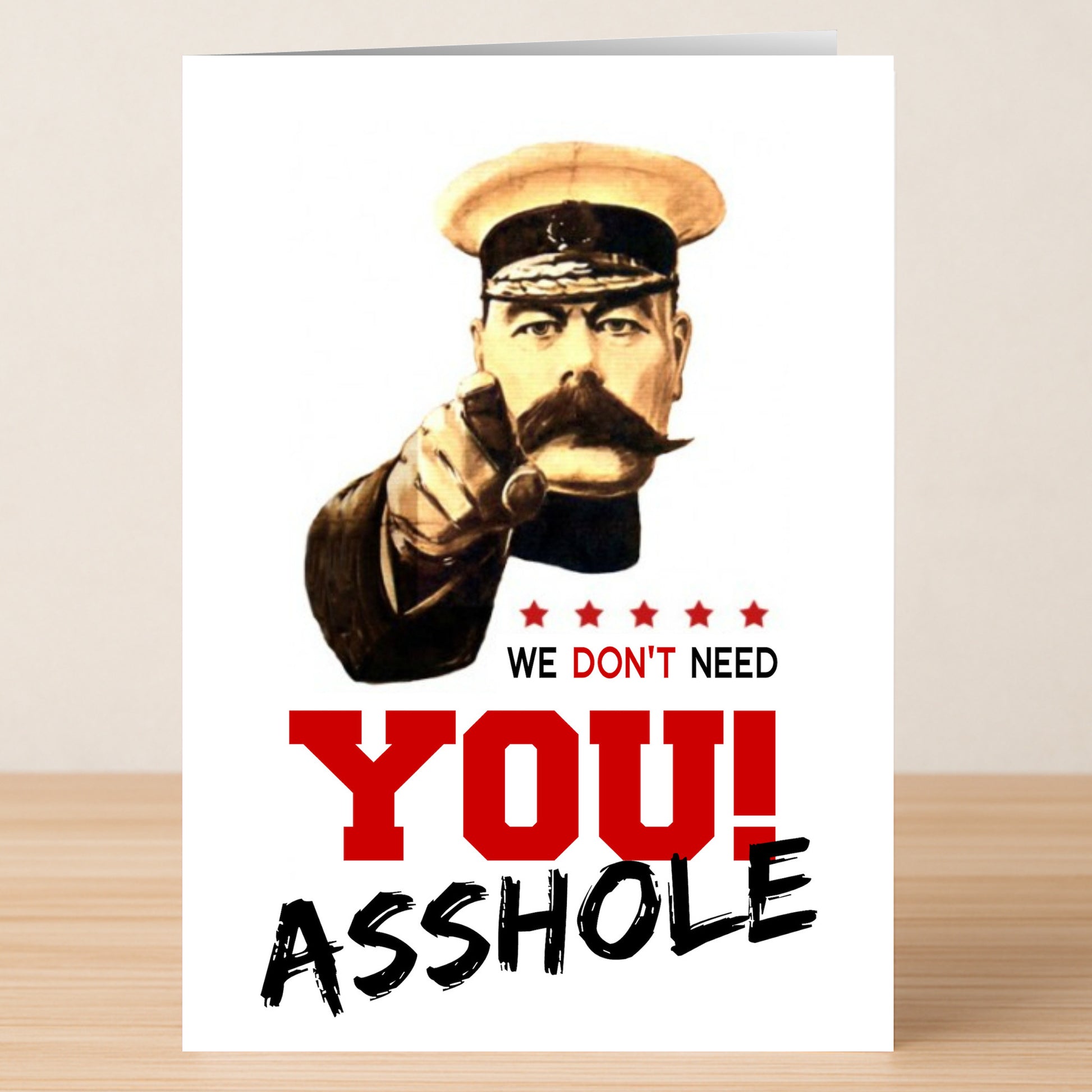 The Twisted Gifts "We Don’t Need You Insulting Farewell Card" features a vintage military officer on a wooden surface with the bold message "WE DON'T NEED YOU! ASSHOLE"—a hilariously snarky way to say goodbye.