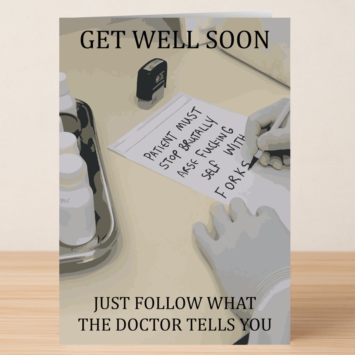 The Twisted Gifts “Patient Must Stop Rude Get Well Soon Card” features a gloved hand writing “PATIENT MUST STOP RUDE FORK BEHAVIOR,” with cheerful text to lift spirits and send get well wishes.