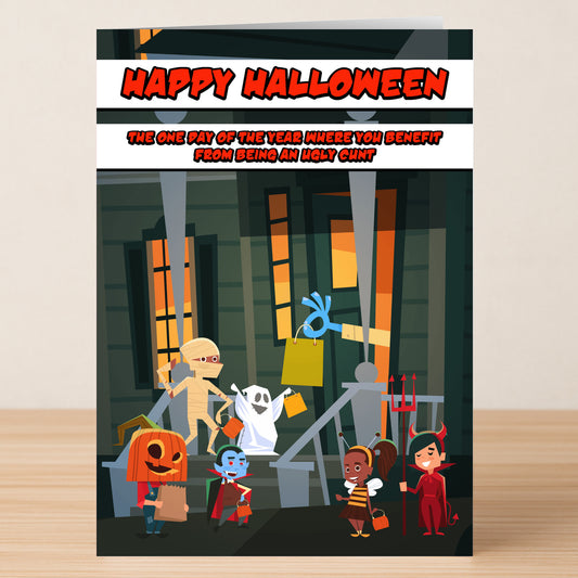 The "Ugly Cnt Rude Halloween Card" by Twisted Gifts features cartoon kids in costumes on a spooky porch, bold red text with a cheeky joke, and a "Happy Halloween" greeting—perfect for sending some laughs this spooky season.