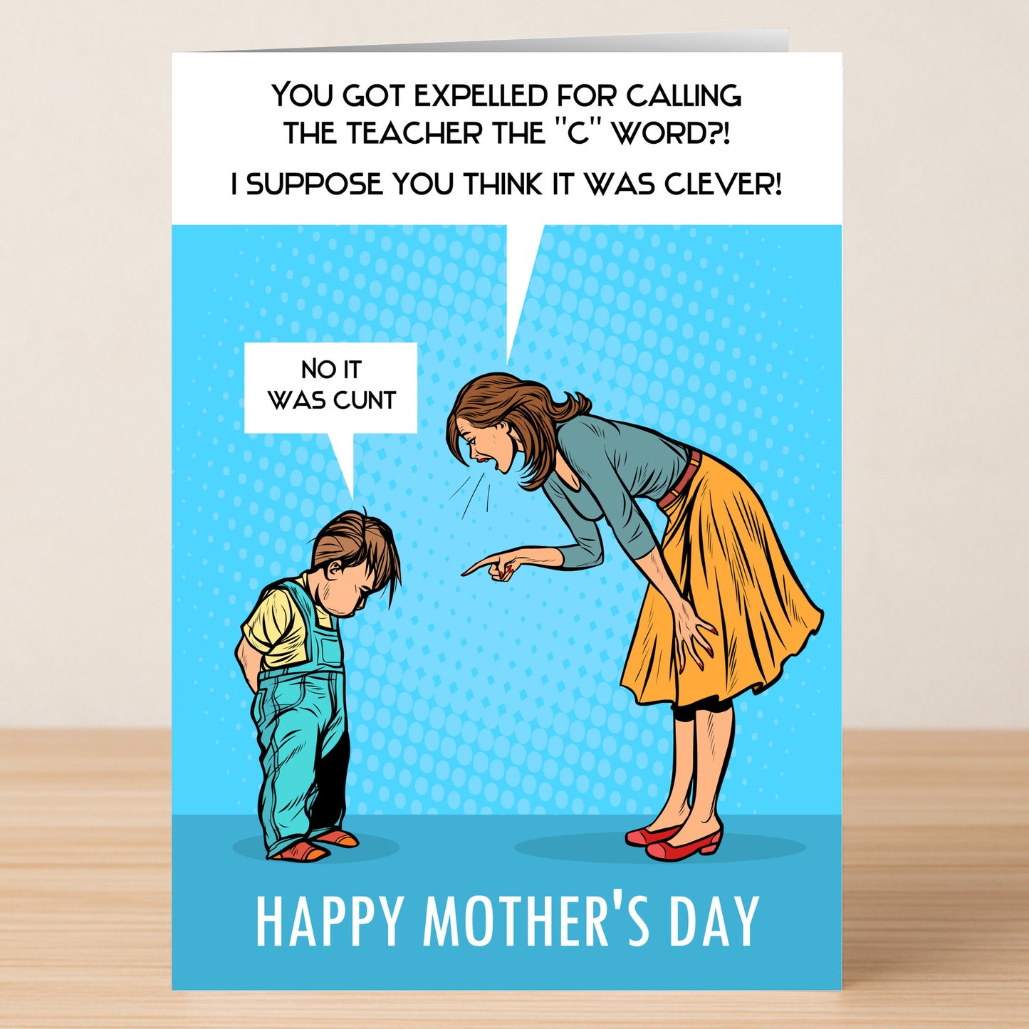 The Expelled Funny Mother's Day Card by Twisted Gifts features a woman scolding a sad child, with a joke about being expelled for using the "C" word—revealed to be "cunt." "Happy Mother's Day" is printed at the bottom.