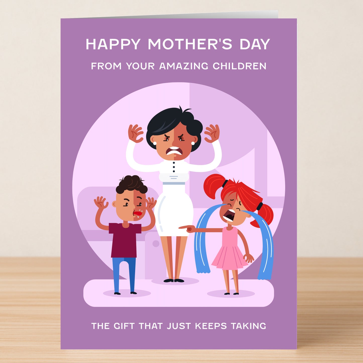 Twisted Gifts' The Gift Funny Mother's Day Card features a frustrated mom with two yelling kids and the caption: “Happy Mother’s Day from your amazing children. The gift that just keeps taking.”.