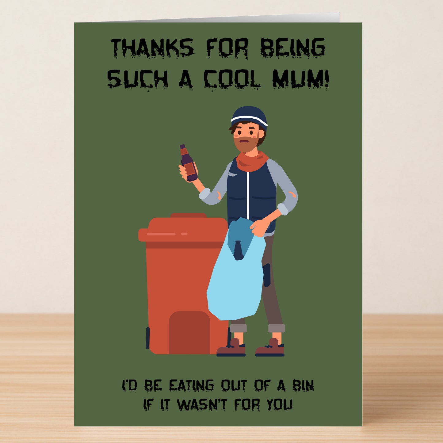 The Out Of The Bin Funny Mother’s Day Card by Twisted Gifts features a cartoon man by a bin with the caption: "Thanks for being such a cool mum! I'd be eating out of a bin if it wasn't for you.