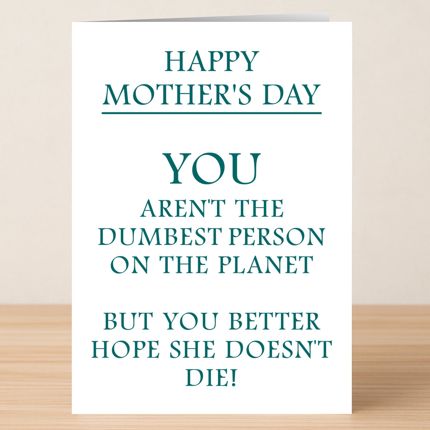 The Twisted Gifts Dumb Insulting Mother's Day Card features bold green text on white and delivers an edgy message: "You aren't the dumbest person on the planet but you better hope she doesn't die!"—perfect for moms with a sense of humor.