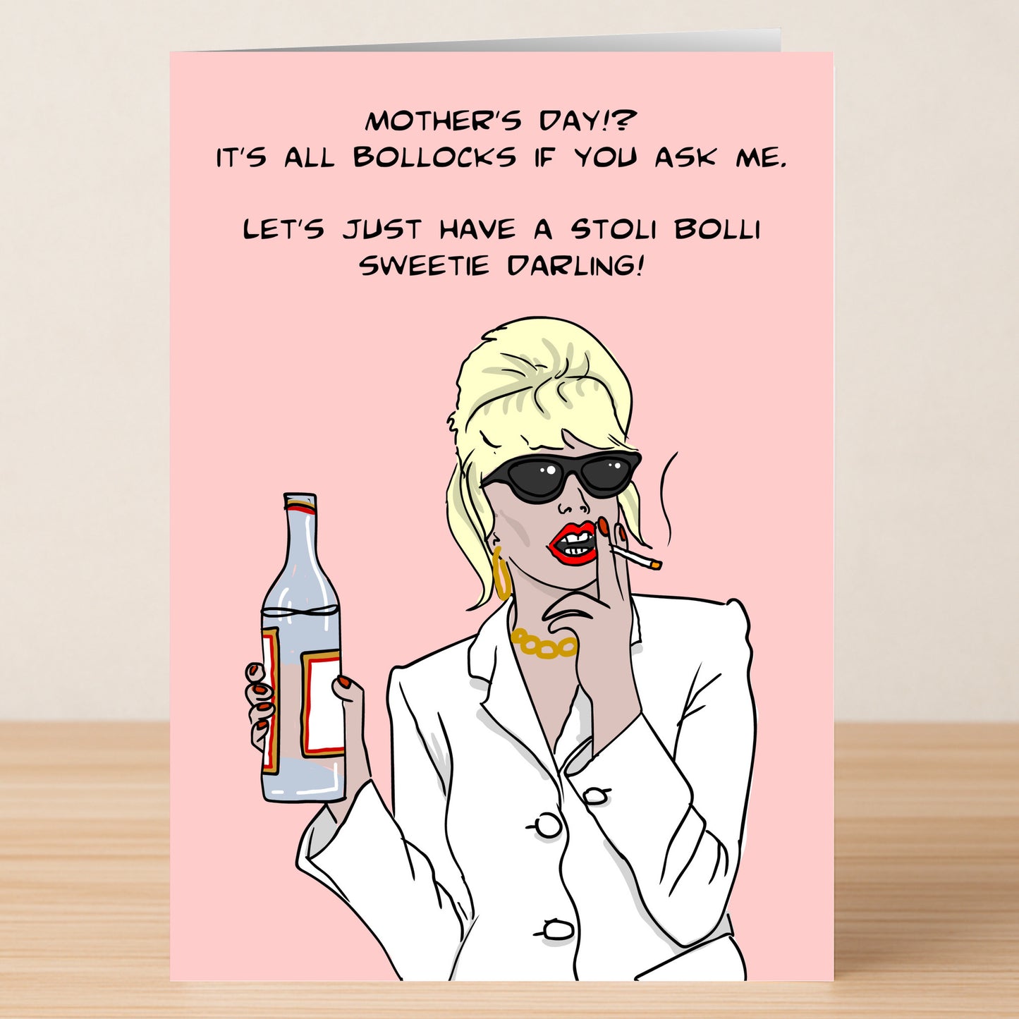 The Stoli Bolli Funny Mother's Day Card by Twisted Gifts features a cartoon woman in sunglasses and a white suit holding a vodka bottle, with a witty message that pokes fun at Mother's Day and suggests drinking Stoli vodka instead.