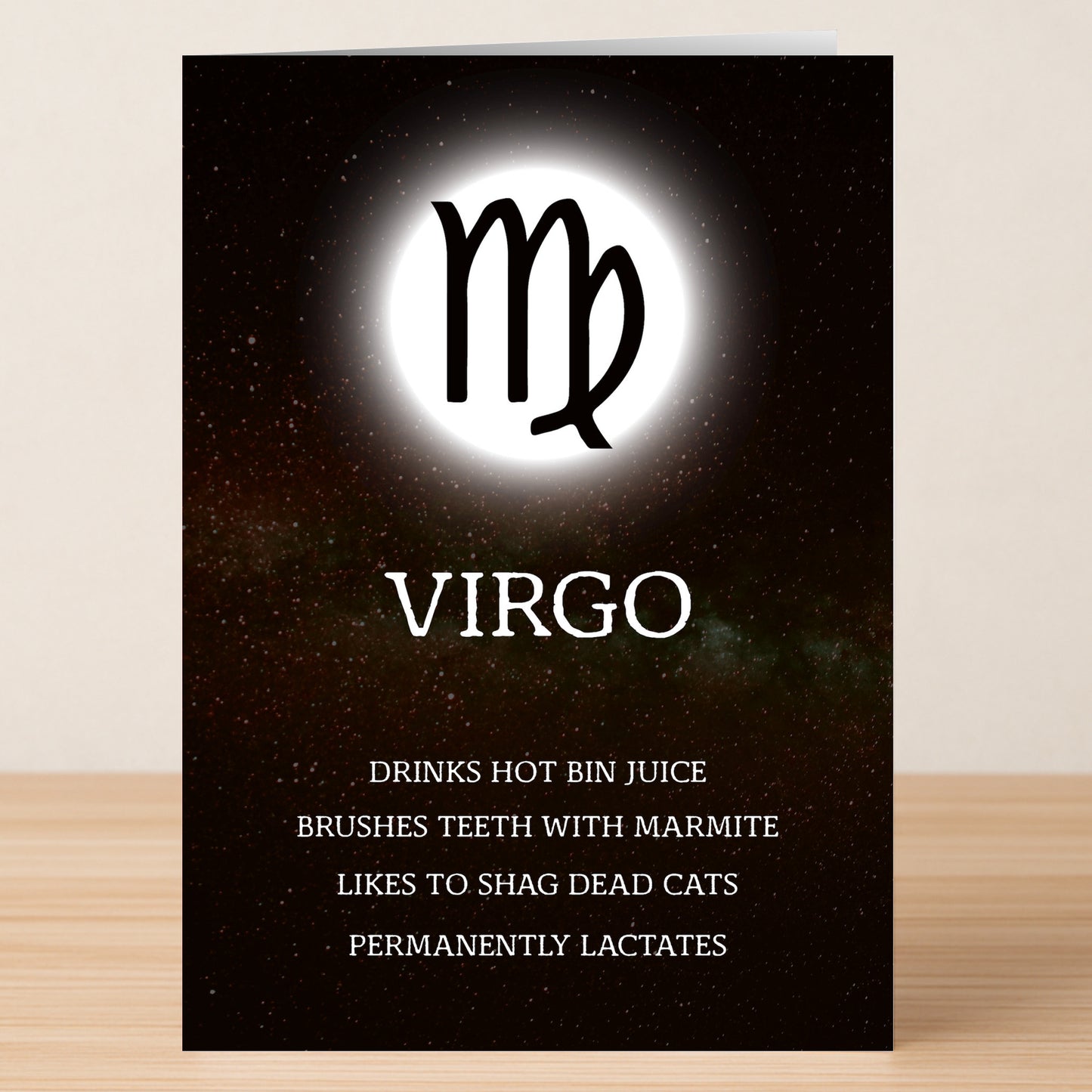 The Virgo Rude Star Sign Card by Twisted Gifts features the Virgo zodiac symbol and funny, absurd traits on a bold starry background—perfect for celebrating Virgo’s unique personality with humor.
