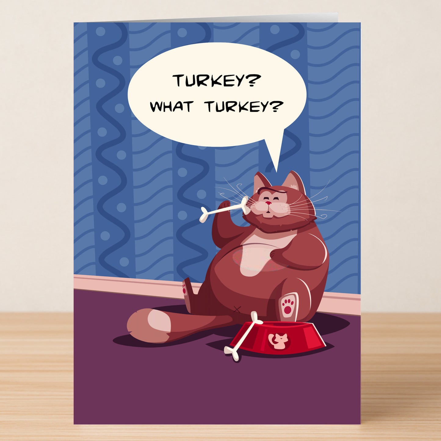 Send holiday laughs with the What Turkey Funny Thanksgiving Card by Twisted Gifts, featuring a chubby cat by an empty food bowl, holding a bone, and asking "Turkey? What turkey?"—perfect for Thanksgiving humor.