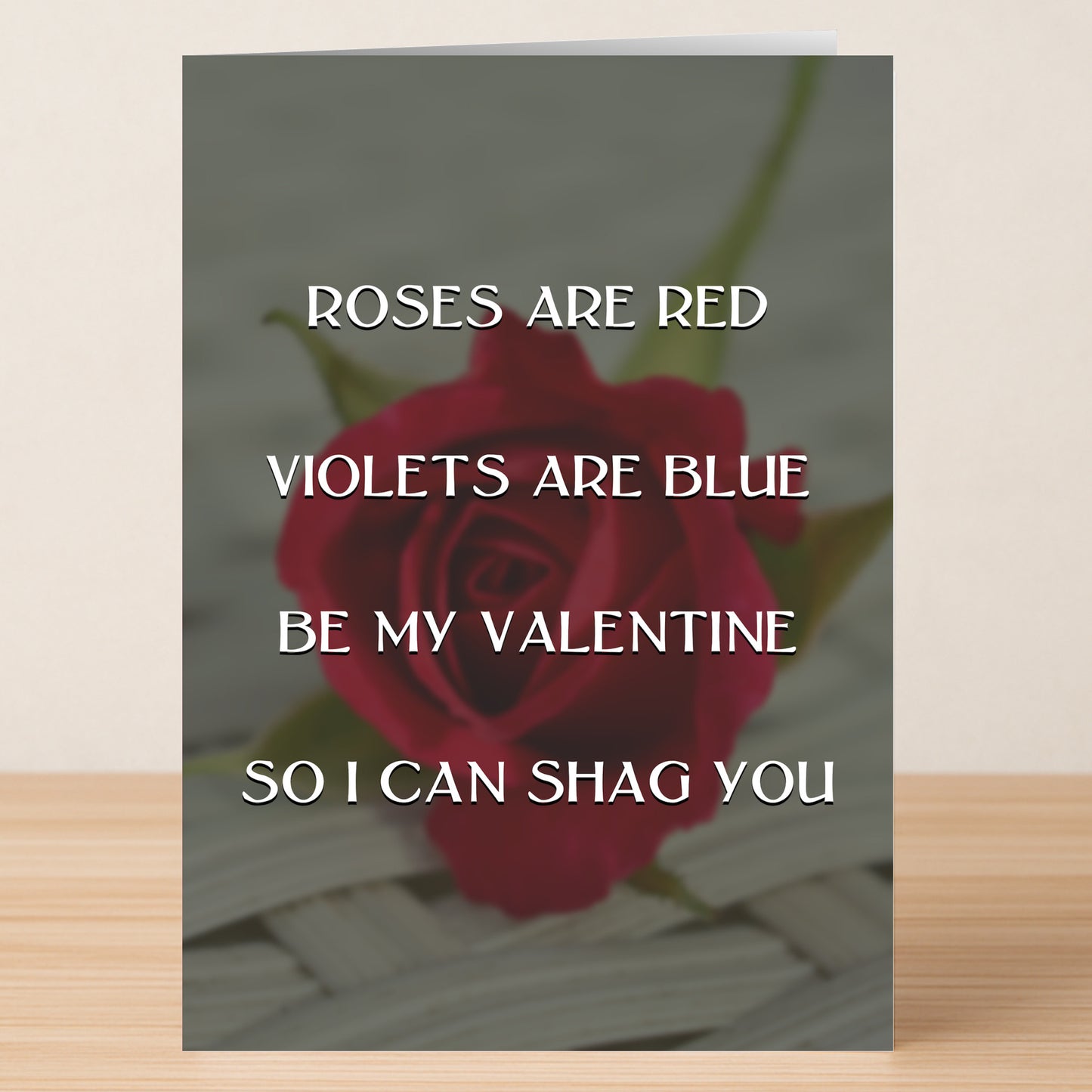The Shag You Rude Valentine's Card by Twisted Gifts features a red rose and the cheeky message: "Roses are red, Violets are blue, Be my Valentine, So I can shag you.