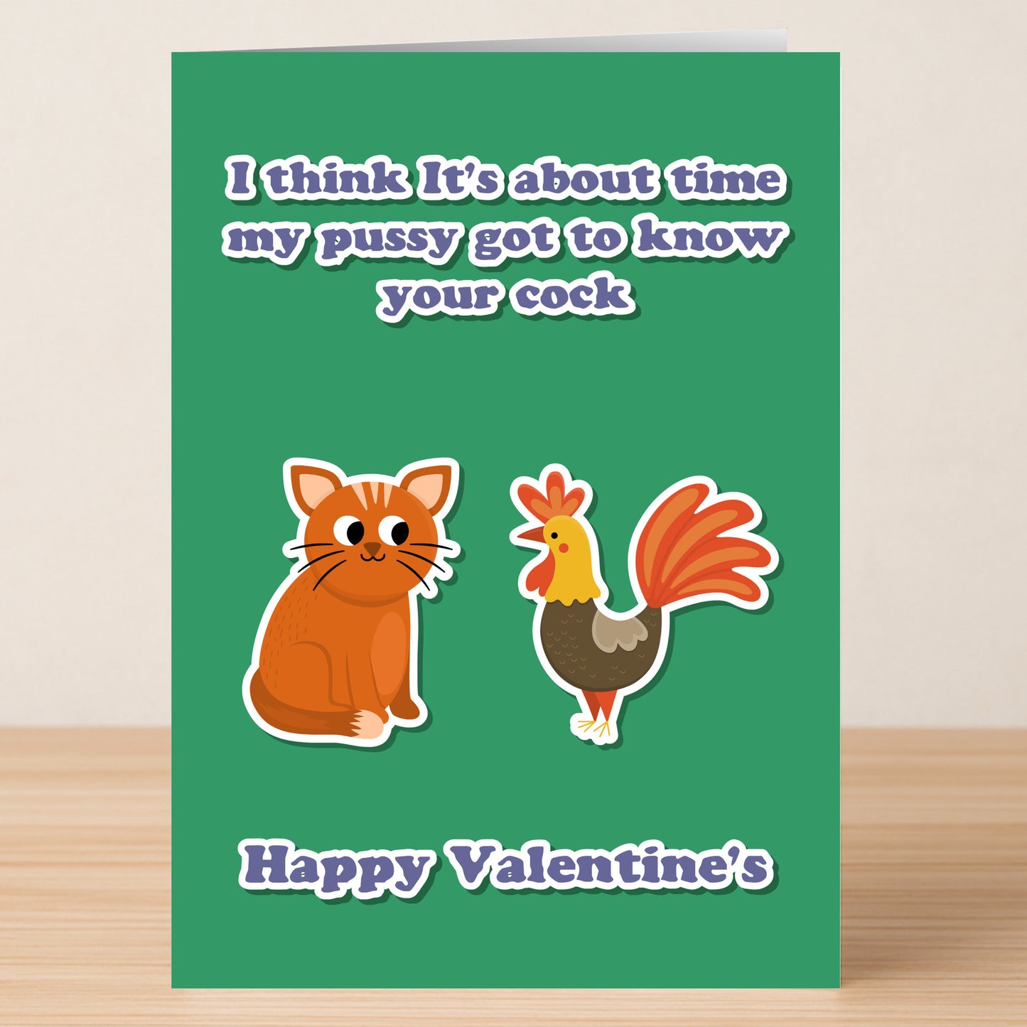The About Time Funny Valentines Card by Twisted Gifts features cartoon cat and rooster art with a cheeky message in white on a green background—a quirky choice for Valentine’s Day.